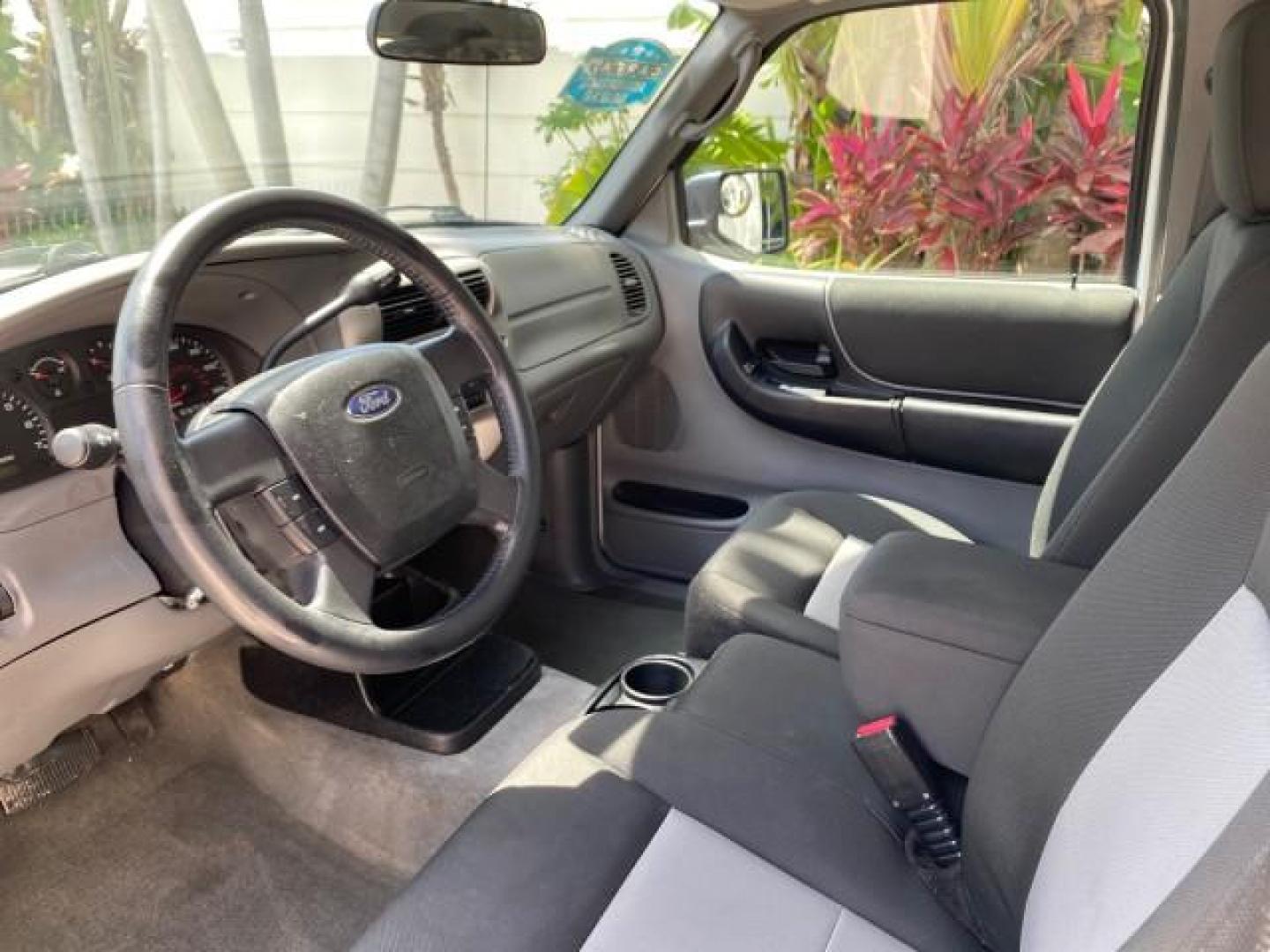 2011 Oxford White /Medium Dark Flint Ford Ranger X CAB XLT LOW MILES 44,686 (1FTKR4EE4BP) with an 4.0L SOHC V6 Engine engine, Automatic transmission, located at 4701 North Dixie Hwy, Pompano Beach, FL, 33064, (954) 422-2889, 26.240938, -80.123474 - OUR WEBPAGE FLORIDACARS1.COM HAS OVER 100 PHOTOS AND FREE CARFAX LINK 2011 Ford Ranger XLT 4 Door Extended Cab Pickup 4.0L V6 F SOHC 16V Gasoline 21 MPG Rear Wheel Drive Features ABS Brakes Air Conditioning AM/FM Stereo Automatic Transmission Auxiliary Audio Input Bed Liner CD Audio Cloth Seats Crui- Photo#49