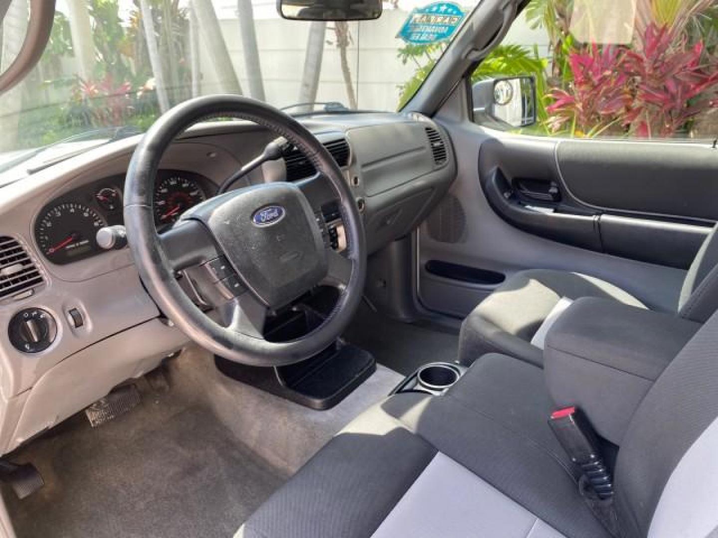 2011 Oxford White /Medium Dark Flint Ford Ranger X CAB XLT LOW MILES 44,686 (1FTKR4EE4BP) with an 4.0L SOHC V6 Engine engine, Automatic transmission, located at 4701 North Dixie Hwy, Pompano Beach, FL, 33064, (954) 422-2889, 26.240938, -80.123474 - OUR WEBPAGE FLORIDACARS1.COM HAS OVER 100 PHOTOS AND FREE CARFAX LINK 2011 Ford Ranger XLT 4 Door Extended Cab Pickup 4.0L V6 F SOHC 16V Gasoline 21 MPG Rear Wheel Drive Features ABS Brakes Air Conditioning AM/FM Stereo Automatic Transmission Auxiliary Audio Input Bed Liner CD Audio Cloth Seats Crui- Photo#50