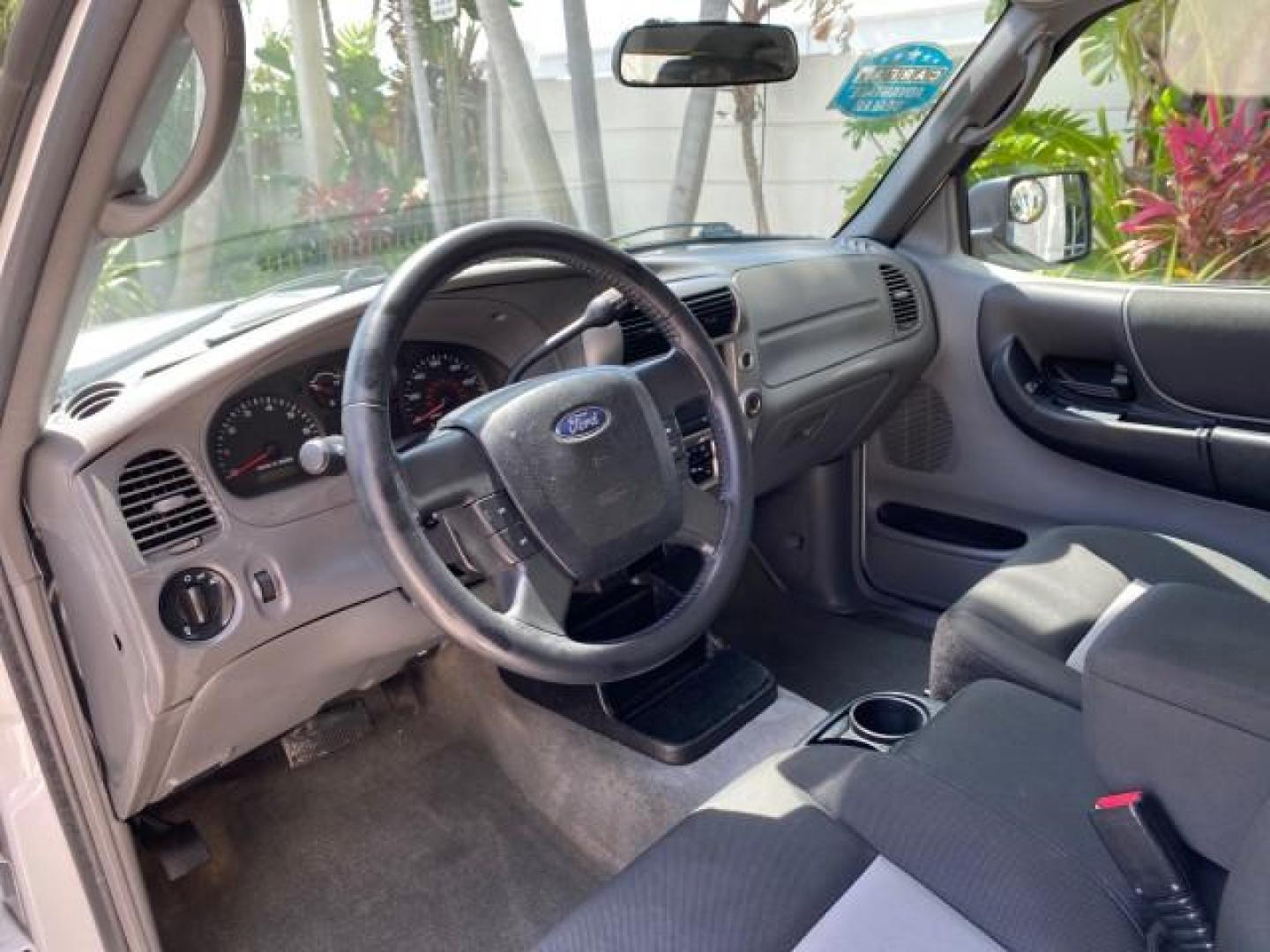 2011 Oxford White /Medium Dark Flint Ford Ranger X CAB XLT LOW MILES 44,686 (1FTKR4EE4BP) with an 4.0L SOHC V6 Engine engine, Automatic transmission, located at 4701 North Dixie Hwy, Pompano Beach, FL, 33064, (954) 422-2889, 26.240938, -80.123474 - OUR WEBPAGE FLORIDACARS1.COM HAS OVER 100 PHOTOS AND FREE CARFAX LINK 2011 Ford Ranger XLT 4 Door Extended Cab Pickup 4.0L V6 F SOHC 16V Gasoline 21 MPG Rear Wheel Drive Features ABS Brakes Air Conditioning AM/FM Stereo Automatic Transmission Auxiliary Audio Input Bed Liner CD Audio Cloth Seats Crui- Photo#51