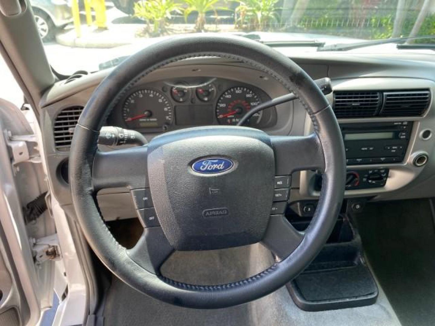 2011 Oxford White /Medium Dark Flint Ford Ranger X CAB XLT LOW MILES 44,686 (1FTKR4EE4BP) with an 4.0L SOHC V6 Engine engine, Automatic transmission, located at 4701 North Dixie Hwy, Pompano Beach, FL, 33064, (954) 422-2889, 26.240938, -80.123474 - OUR WEBPAGE FLORIDACARS1.COM HAS OVER 100 PHOTOS AND FREE CARFAX LINK 2011 Ford Ranger XLT 4 Door Extended Cab Pickup 4.0L V6 F SOHC 16V Gasoline 21 MPG Rear Wheel Drive Features ABS Brakes Air Conditioning AM/FM Stereo Automatic Transmission Auxiliary Audio Input Bed Liner CD Audio Cloth Seats Crui- Photo#52