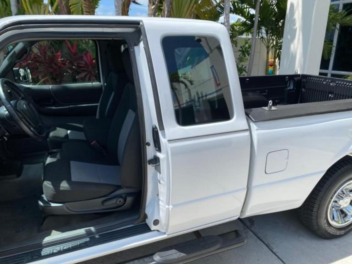 2011 Oxford White /Medium Dark Flint Ford Ranger X CAB XLT LOW MILES 44,686 (1FTKR4EE4BP) with an 4.0L SOHC V6 Engine engine, Automatic transmission, located at 4701 North Dixie Hwy, Pompano Beach, FL, 33064, (954) 422-2889, 26.240938, -80.123474 - OUR WEBPAGE FLORIDACARS1.COM HAS OVER 100 PHOTOS AND FREE CARFAX LINK 2011 Ford Ranger XLT 4 Door Extended Cab Pickup 4.0L V6 F SOHC 16V Gasoline 21 MPG Rear Wheel Drive Features ABS Brakes Air Conditioning AM/FM Stereo Automatic Transmission Auxiliary Audio Input Bed Liner CD Audio Cloth Seats Crui- Photo#76