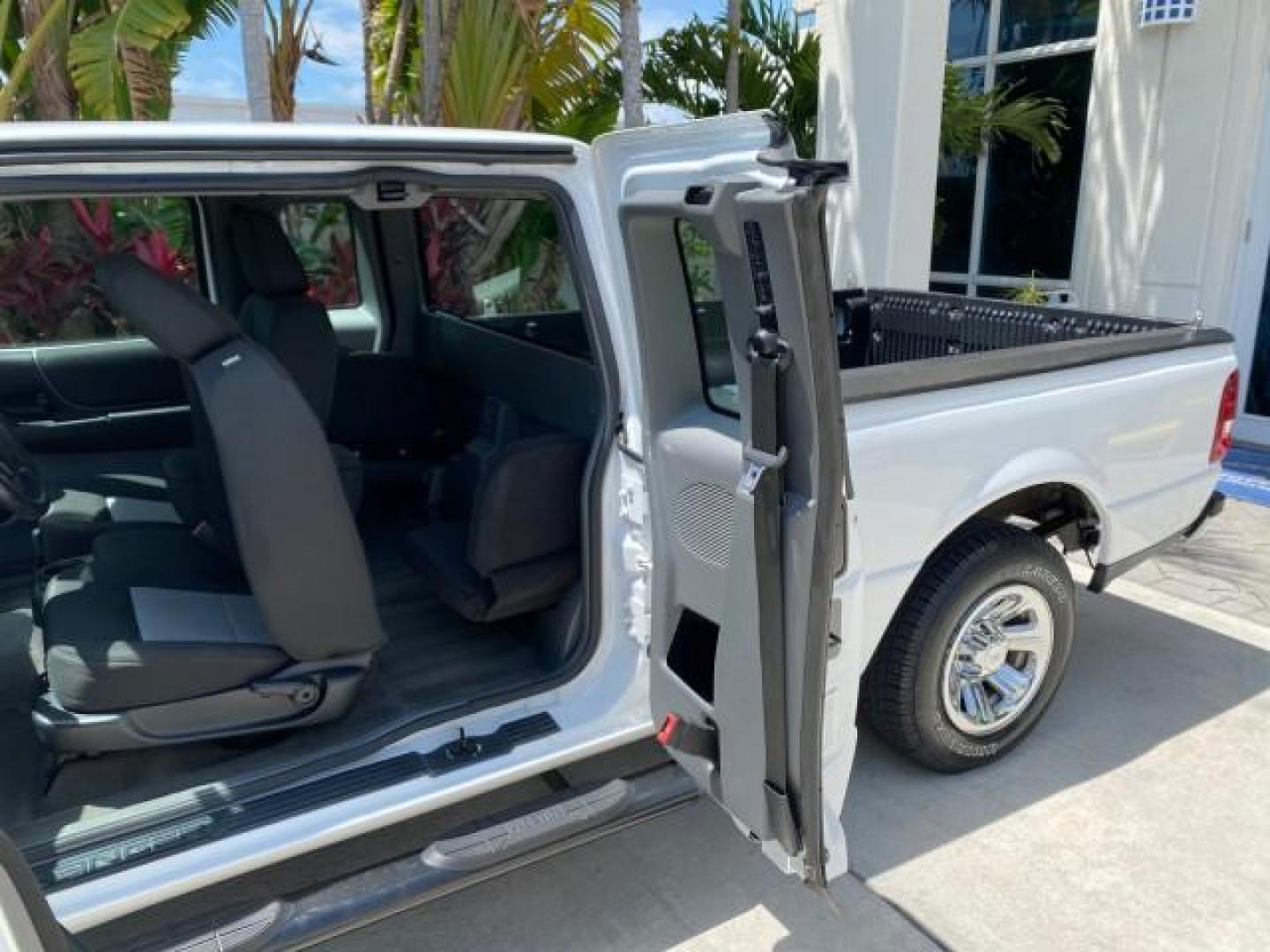 2011 Oxford White /Medium Dark Flint Ford Ranger X CAB XLT LOW MILES 44,686 (1FTKR4EE4BP) with an 4.0L SOHC V6 Engine engine, Automatic transmission, located at 4701 North Dixie Hwy, Pompano Beach, FL, 33064, (954) 422-2889, 26.240938, -80.123474 - OUR WEBPAGE FLORIDACARS1.COM HAS OVER 100 PHOTOS AND FREE CARFAX LINK 2011 Ford Ranger XLT 4 Door Extended Cab Pickup 4.0L V6 F SOHC 16V Gasoline 21 MPG Rear Wheel Drive Features ABS Brakes Air Conditioning AM/FM Stereo Automatic Transmission Auxiliary Audio Input Bed Liner CD Audio Cloth Seats Crui- Photo#78