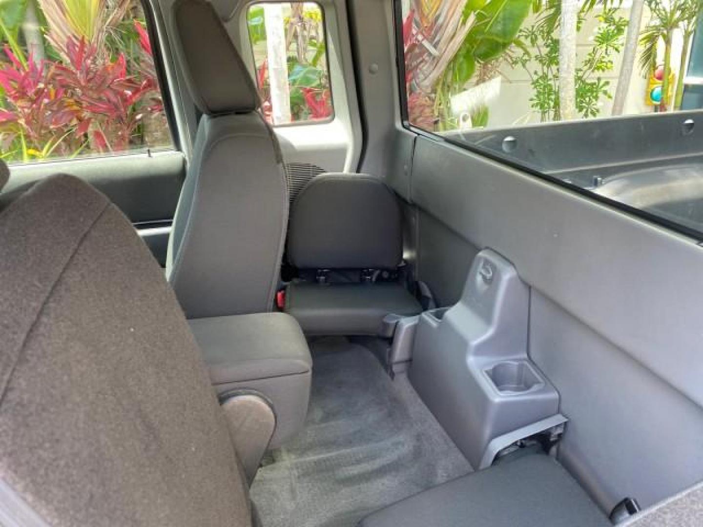 2011 Oxford White /Medium Dark Flint Ford Ranger X CAB XLT LOW MILES 44,686 (1FTKR4EE4BP) with an 4.0L SOHC V6 Engine engine, Automatic transmission, located at 4701 North Dixie Hwy, Pompano Beach, FL, 33064, (954) 422-2889, 26.240938, -80.123474 - OUR WEBPAGE FLORIDACARS1.COM HAS OVER 100 PHOTOS AND FREE CARFAX LINK 2011 Ford Ranger XLT 4 Door Extended Cab Pickup 4.0L V6 F SOHC 16V Gasoline 21 MPG Rear Wheel Drive Features ABS Brakes Air Conditioning AM/FM Stereo Automatic Transmission Auxiliary Audio Input Bed Liner CD Audio Cloth Seats Crui- Photo#81