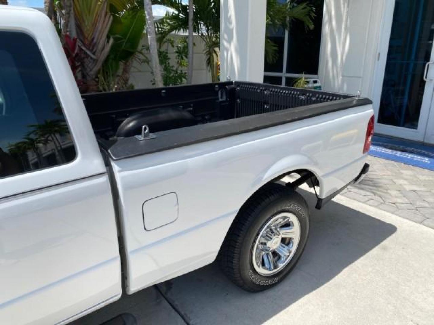 2011 Oxford White /Medium Dark Flint Ford Ranger X CAB XLT LOW MILES 44,686 (1FTKR4EE4BP) with an 4.0L SOHC V6 Engine engine, Automatic transmission, located at 4701 North Dixie Hwy, Pompano Beach, FL, 33064, (954) 422-2889, 26.240938, -80.123474 - OUR WEBPAGE FLORIDACARS1.COM HAS OVER 100 PHOTOS AND FREE CARFAX LINK 2011 Ford Ranger XLT 4 Door Extended Cab Pickup 4.0L V6 F SOHC 16V Gasoline 21 MPG Rear Wheel Drive Features ABS Brakes Air Conditioning AM/FM Stereo Automatic Transmission Auxiliary Audio Input Bed Liner CD Audio Cloth Seats Crui- Photo#83