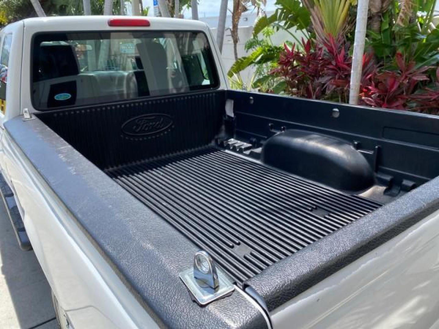2011 Oxford White /Medium Dark Flint Ford Ranger X CAB XLT LOW MILES 44,686 (1FTKR4EE4BP) with an 4.0L SOHC V6 Engine engine, Automatic transmission, located at 4701 North Dixie Hwy, Pompano Beach, FL, 33064, (954) 422-2889, 26.240938, -80.123474 - OUR WEBPAGE FLORIDACARS1.COM HAS OVER 100 PHOTOS AND FREE CARFAX LINK 2011 Ford Ranger XLT 4 Door Extended Cab Pickup 4.0L V6 F SOHC 16V Gasoline 21 MPG Rear Wheel Drive Features ABS Brakes Air Conditioning AM/FM Stereo Automatic Transmission Auxiliary Audio Input Bed Liner CD Audio Cloth Seats Crui- Photo#94