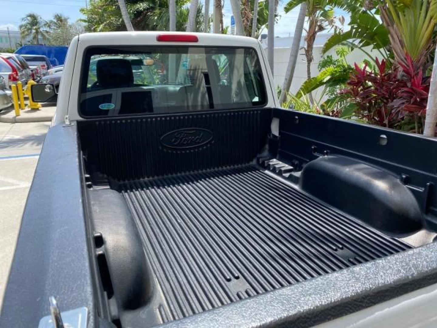 2011 Oxford White /Medium Dark Flint Ford Ranger X CAB XLT LOW MILES 44,686 (1FTKR4EE4BP) with an 4.0L SOHC V6 Engine engine, Automatic transmission, located at 4701 North Dixie Hwy, Pompano Beach, FL, 33064, (954) 422-2889, 26.240938, -80.123474 - OUR WEBPAGE FLORIDACARS1.COM HAS OVER 100 PHOTOS AND FREE CARFAX LINK 2011 Ford Ranger XLT 4 Door Extended Cab Pickup 4.0L V6 F SOHC 16V Gasoline 21 MPG Rear Wheel Drive Features ABS Brakes Air Conditioning AM/FM Stereo Automatic Transmission Auxiliary Audio Input Bed Liner CD Audio Cloth Seats Crui- Photo#95