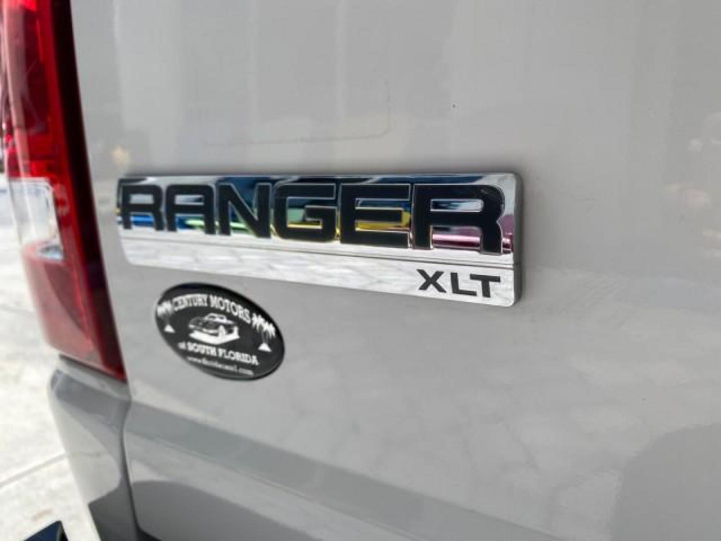 2011 Oxford White /Medium Dark Flint Ford Ranger X CAB XLT LOW MILES 44,686 (1FTKR4EE4BP) with an 4.0L SOHC V6 Engine engine, Automatic transmission, located at 4701 North Dixie Hwy, Pompano Beach, FL, 33064, (954) 422-2889, 26.240938, -80.123474 - OUR WEBPAGE FLORIDACARS1.COM HAS OVER 100 PHOTOS AND FREE CARFAX LINK 2011 Ford Ranger XLT 4 Door Extended Cab Pickup 4.0L V6 F SOHC 16V Gasoline 21 MPG Rear Wheel Drive Features ABS Brakes Air Conditioning AM/FM Stereo Automatic Transmission Auxiliary Audio Input Bed Liner CD Audio Cloth Seats Crui- Photo#99