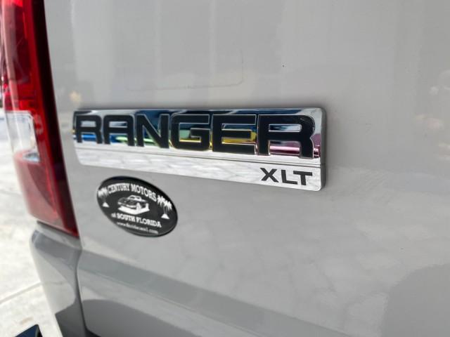 2011 Oxford White /Medium Dark Flint Ford Ranger XLT LOW MILES 44,686 (1FTKR4EE4BP) with an 4.0L SOHC V6 Engine engine, Automatic transmission, located at 4701 North Dixie Hwy, Pompano Beach, FL, 33064, (954) 422-2889, 26.240938, -80.123474 - OUR WEBPAGE FLORIDACARS1.COM HAS OVER 100 PHOTOS AND FREE CARFAX LINK 2011 Ford Ranger XLT 4 Door Extended Cab Pickup 4.0L V6 F SOHC 16V Gasoline 21 MPG Rear Wheel Drive Features ABS Brakes Air Conditioning AM/FM Stereo Automatic Transmission Auxiliary Audio Input Bed Liner CD Audio Cloth Seats Crui - Photo#99