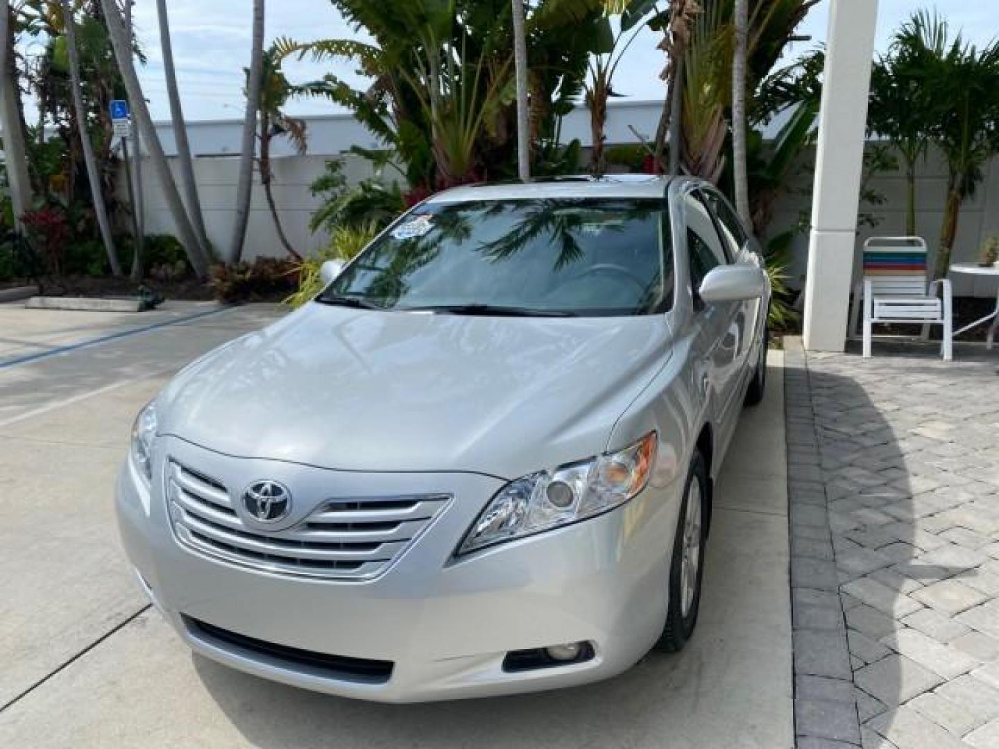 2007 Titanium Metallic /Ash Toyota Camry XLE LOW MILES 15,752 1 OWNER (4T1BK46K37U) with an 3.5L DOHC MPFI VVT-i 24-Valve V6 Engine engine, Automatic transmission, located at 4701 North Dixie Hwy, Pompano Beach, FL, 33064, (954) 422-2889, 26.240938, -80.123474 - OUR WEBPAGE FLORIDACARS1.COM HAS OVER 100 PHOTOS AND FREE CARFAX LINK 2007 Toyota Camry XLE 1 OWNER Sedan 4 DR 3.5L V6 F DOHC 24V Gasoline 31 MPG Front Wheel Drive Features ABS Brakes Air Conditioning Alloy Wheels AM/FM Stereo Automatic Transmission Auxiliary Audio Input Bluetooth Technology CD Audi- Photo#3