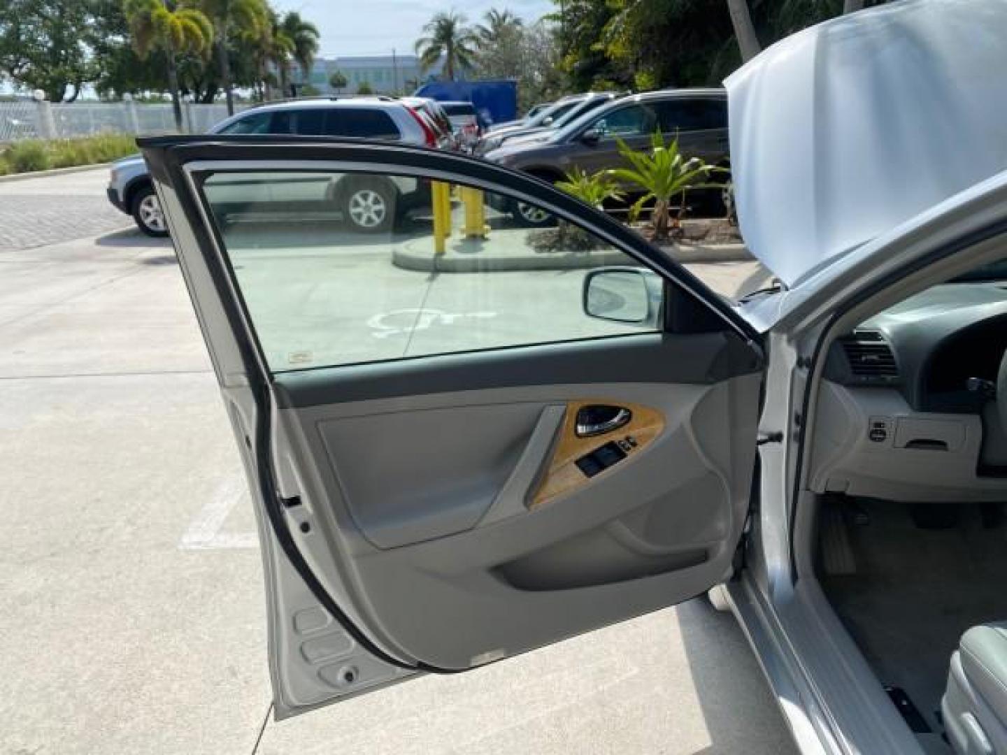 2007 Titanium Metallic /Ash Toyota Camry XLE LOW MILES 15,752 1 OWNER (4T1BK46K37U) with an 3.5L DOHC MPFI VVT-i 24-Valve V6 Engine engine, Automatic transmission, located at 4701 North Dixie Hwy, Pompano Beach, FL, 33064, (954) 422-2889, 26.240938, -80.123474 - OUR WEBPAGE FLORIDACARS1.COM HAS OVER 100 PHOTOS AND FREE CARFAX LINK 2007 Toyota Camry XLE 1 OWNER Sedan 4 DR 3.5L V6 F DOHC 24V Gasoline 31 MPG Front Wheel Drive Features ABS Brakes Air Conditioning Alloy Wheels AM/FM Stereo Automatic Transmission Auxiliary Audio Input Bluetooth Technology CD Audi- Photo#9