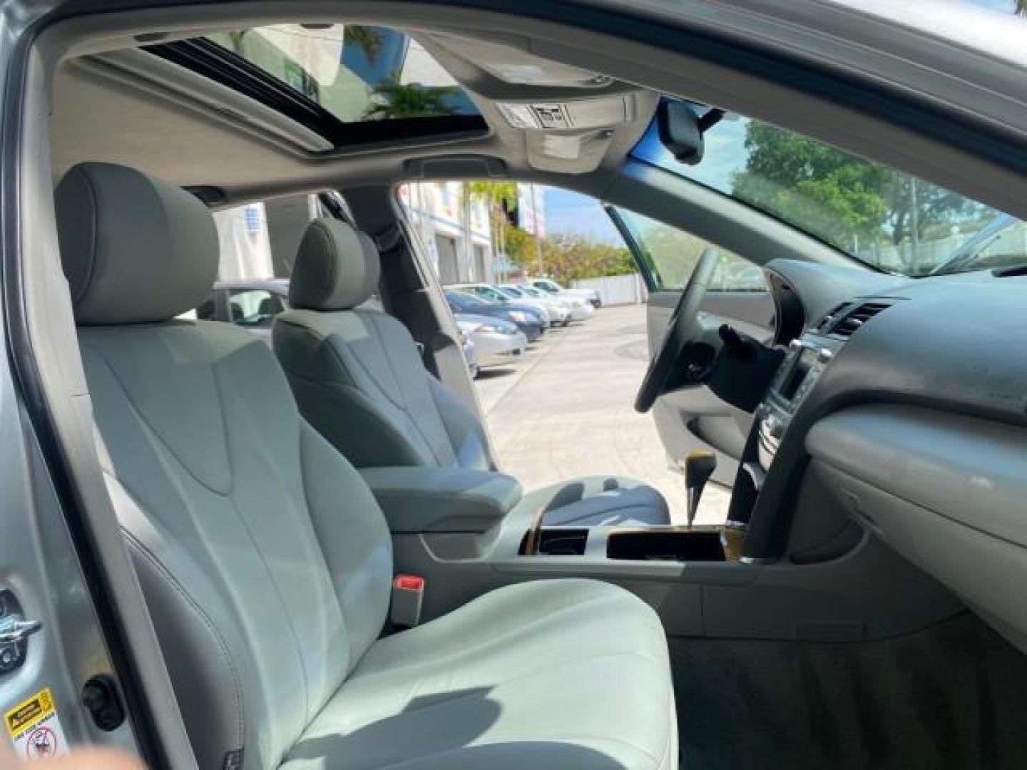 2007 Titanium Metallic /Ash Toyota Camry XLE LOW MILES 15,752 1 OWNER (4T1BK46K37U) with an 3.5L DOHC MPFI VVT-i 24-Valve V6 Engine engine, Automatic transmission, located at 4701 North Dixie Hwy, Pompano Beach, FL, 33064, (954) 422-2889, 26.240938, -80.123474 - OUR WEBPAGE FLORIDACARS1.COM HAS OVER 100 PHOTOS AND FREE CARFAX LINK 2007 Toyota Camry XLE 1 OWNER Sedan 4 DR 3.5L V6 F DOHC 24V Gasoline 31 MPG Front Wheel Drive Features ABS Brakes Air Conditioning Alloy Wheels AM/FM Stereo Automatic Transmission Auxiliary Audio Input Bluetooth Technology CD Audi- Photo#12