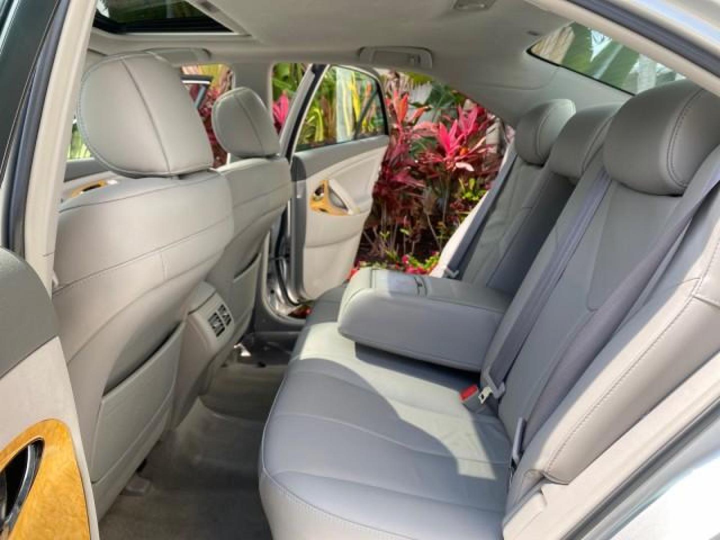 2007 Titanium Metallic /Ash Toyota Camry XLE LOW MILES 15,752 1 OWNER (4T1BK46K37U) with an 3.5L DOHC MPFI VVT-i 24-Valve V6 Engine engine, Automatic transmission, located at 4701 North Dixie Hwy, Pompano Beach, FL, 33064, (954) 422-2889, 26.240938, -80.123474 - OUR WEBPAGE FLORIDACARS1.COM HAS OVER 100 PHOTOS AND FREE CARFAX LINK 2007 Toyota Camry XLE 1 OWNER Sedan 4 DR 3.5L V6 F DOHC 24V Gasoline 31 MPG Front Wheel Drive Features ABS Brakes Air Conditioning Alloy Wheels AM/FM Stereo Automatic Transmission Auxiliary Audio Input Bluetooth Technology CD Audi- Photo#14