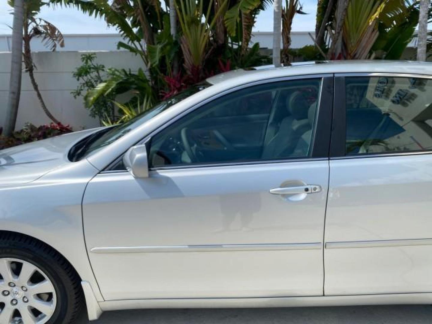2007 Titanium Metallic /Ash Toyota Camry XLE LOW MILES 15,752 1 OWNER (4T1BK46K37U) with an 3.5L DOHC MPFI VVT-i 24-Valve V6 Engine engine, Automatic transmission, located at 4701 North Dixie Hwy, Pompano Beach, FL, 33064, (954) 422-2889, 26.240938, -80.123474 - OUR WEBPAGE FLORIDACARS1.COM HAS OVER 100 PHOTOS AND FREE CARFAX LINK 2007 Toyota Camry XLE 1 OWNER Sedan 4 DR 3.5L V6 F DOHC 24V Gasoline 31 MPG Front Wheel Drive Features ABS Brakes Air Conditioning Alloy Wheels AM/FM Stereo Automatic Transmission Auxiliary Audio Input Bluetooth Technology CD Audi- Photo#36