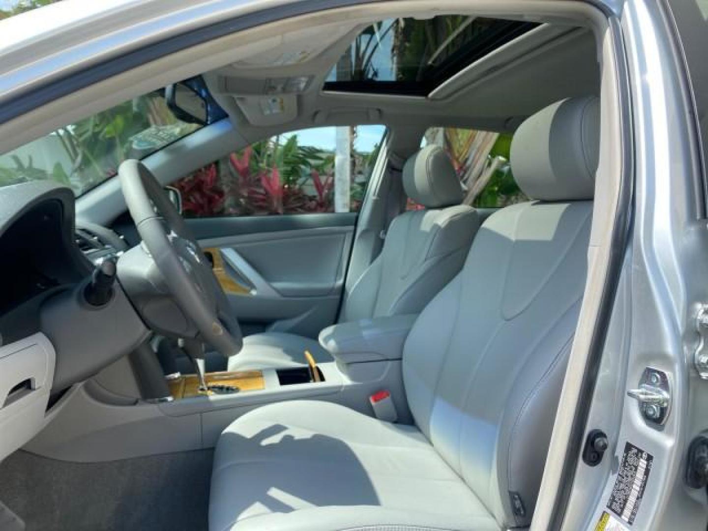 2007 Titanium Metallic /Ash Toyota Camry XLE LOW MILES 15,752 1 OWNER (4T1BK46K37U) with an 3.5L DOHC MPFI VVT-i 24-Valve V6 Engine engine, Automatic transmission, located at 4701 North Dixie Hwy, Pompano Beach, FL, 33064, (954) 422-2889, 26.240938, -80.123474 - OUR WEBPAGE FLORIDACARS1.COM HAS OVER 100 PHOTOS AND FREE CARFAX LINK 2007 Toyota Camry XLE 1 OWNER Sedan 4 DR 3.5L V6 F DOHC 24V Gasoline 31 MPG Front Wheel Drive Features ABS Brakes Air Conditioning Alloy Wheels AM/FM Stereo Automatic Transmission Auxiliary Audio Input Bluetooth Technology CD Audi- Photo#41