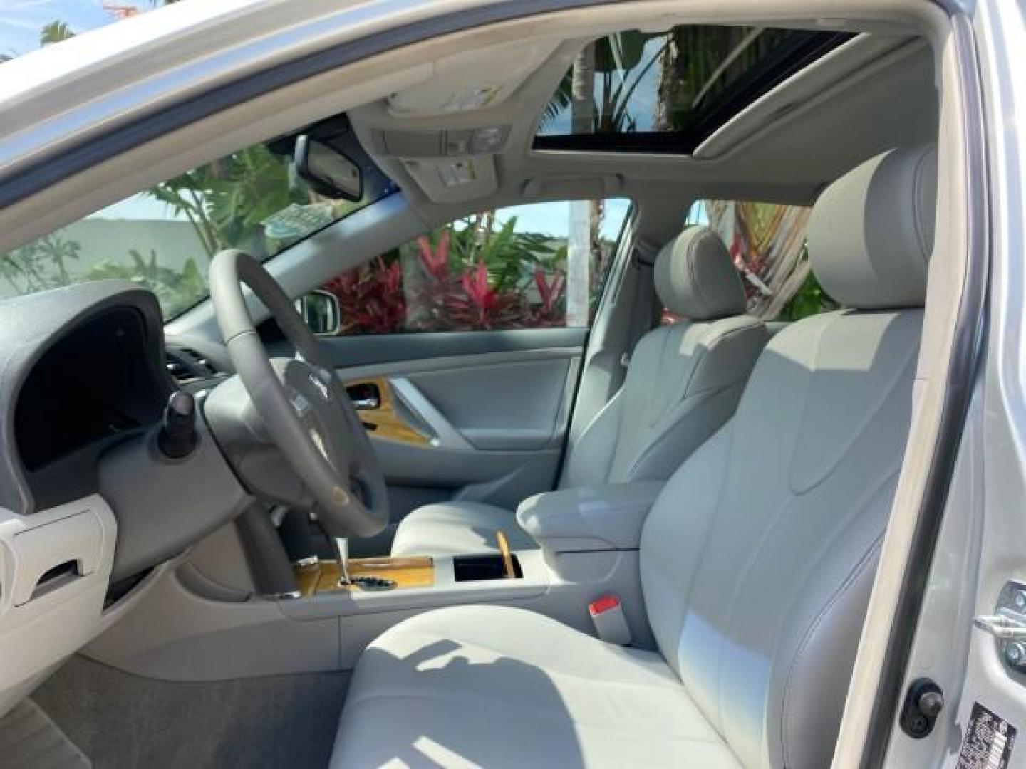 2007 Titanium Metallic /Ash Toyota Camry XLE LOW MILES 15,752 1 OWNER (4T1BK46K37U) with an 3.5L DOHC MPFI VVT-i 24-Valve V6 Engine engine, Automatic transmission, located at 4701 North Dixie Hwy, Pompano Beach, FL, 33064, (954) 422-2889, 26.240938, -80.123474 - OUR WEBPAGE FLORIDACARS1.COM HAS OVER 100 PHOTOS AND FREE CARFAX LINK 2007 Toyota Camry XLE 1 OWNER Sedan 4 DR 3.5L V6 F DOHC 24V Gasoline 31 MPG Front Wheel Drive Features ABS Brakes Air Conditioning Alloy Wheels AM/FM Stereo Automatic Transmission Auxiliary Audio Input Bluetooth Technology CD Audi- Photo#42