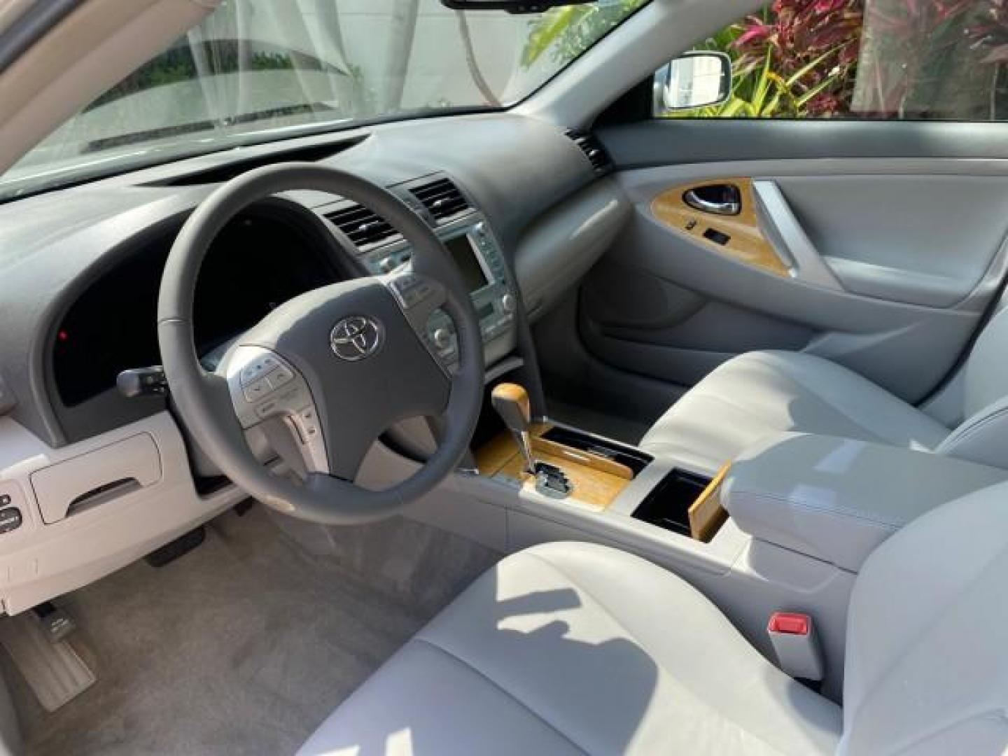 2007 Titanium Metallic /Ash Toyota Camry XLE LOW MILES 15,752 1 OWNER (4T1BK46K37U) with an 3.5L DOHC MPFI VVT-i 24-Valve V6 Engine engine, Automatic transmission, located at 4701 North Dixie Hwy, Pompano Beach, FL, 33064, (954) 422-2889, 26.240938, -80.123474 - OUR WEBPAGE FLORIDACARS1.COM HAS OVER 100 PHOTOS AND FREE CARFAX LINK 2007 Toyota Camry XLE 1 OWNER Sedan 4 DR 3.5L V6 F DOHC 24V Gasoline 31 MPG Front Wheel Drive Features ABS Brakes Air Conditioning Alloy Wheels AM/FM Stereo Automatic Transmission Auxiliary Audio Input Bluetooth Technology CD Audi- Photo#44