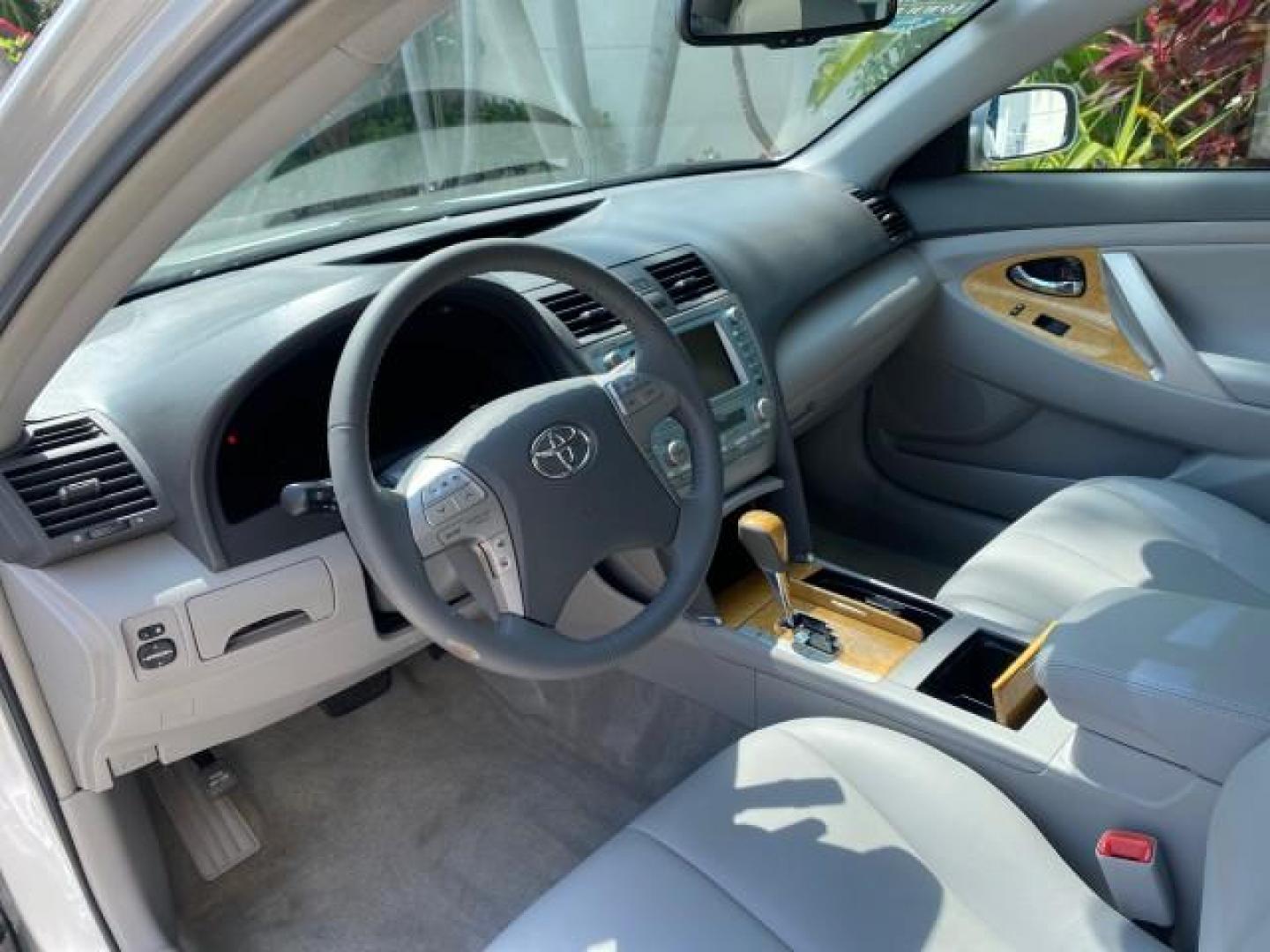 2007 Titanium Metallic /Ash Toyota Camry XLE LOW MILES 15,752 1 OWNER (4T1BK46K37U) with an 3.5L DOHC MPFI VVT-i 24-Valve V6 Engine engine, Automatic transmission, located at 4701 North Dixie Hwy, Pompano Beach, FL, 33064, (954) 422-2889, 26.240938, -80.123474 - OUR WEBPAGE FLORIDACARS1.COM HAS OVER 100 PHOTOS AND FREE CARFAX LINK 2007 Toyota Camry XLE 1 OWNER Sedan 4 DR 3.5L V6 F DOHC 24V Gasoline 31 MPG Front Wheel Drive Features ABS Brakes Air Conditioning Alloy Wheels AM/FM Stereo Automatic Transmission Auxiliary Audio Input Bluetooth Technology CD Audi- Photo#45