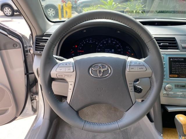 2007 Titanium Metallic /Ash Toyota Camry XLE LOW MILES 15,752 1 OWNER (4T1BK46K37U) with an 3.5L DOHC MPFI VVT-i 24-Valve V6 Engine engine, Automatic transmission, located at 4701 North Dixie Hwy, Pompano Beach, FL, 33064, (954) 422-2889, 26.240938, -80.123474 - OUR WEBPAGE FLORIDACARS1.COM HAS OVER 100 PHOTOS AND FREE CARFAX LINK 2007 Toyota Camry XLE 1 OWNER Sedan 4 DR 3.5L V6 F DOHC 24V Gasoline 31 MPG Front Wheel Drive Features ABS Brakes Air Conditioning Alloy Wheels AM/FM Stereo Automatic Transmission Auxiliary Audio Input Bluetooth Technology CD Audi - Photo#46