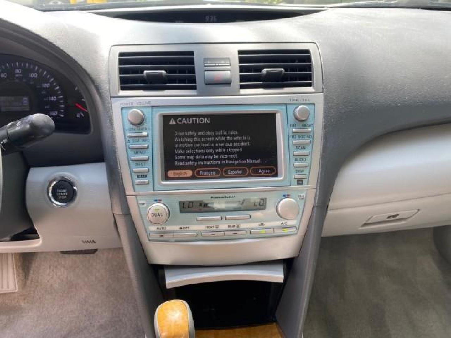 2007 Titanium Metallic /Ash Toyota Camry XLE LOW MILES 15,752 1 OWNER (4T1BK46K37U) with an 3.5L DOHC MPFI VVT-i 24-Valve V6 Engine engine, Automatic transmission, located at 4701 North Dixie Hwy, Pompano Beach, FL, 33064, (954) 422-2889, 26.240938, -80.123474 - OUR WEBPAGE FLORIDACARS1.COM HAS OVER 100 PHOTOS AND FREE CARFAX LINK 2007 Toyota Camry XLE 1 OWNER Sedan 4 DR 3.5L V6 F DOHC 24V Gasoline 31 MPG Front Wheel Drive Features ABS Brakes Air Conditioning Alloy Wheels AM/FM Stereo Automatic Transmission Auxiliary Audio Input Bluetooth Technology CD Audi- Photo#56