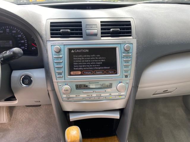 2007 Titanium Metallic /Ash Toyota Camry XLE LOW MILES 15,752 1 OWNER (4T1BK46K37U) with an 3.5L DOHC MPFI VVT-i 24-Valve V6 Engine engine, Automatic transmission, located at 4701 North Dixie Hwy, Pompano Beach, FL, 33064, (954) 422-2889, 26.240938, -80.123474 - OUR WEBPAGE FLORIDACARS1.COM HAS OVER 100 PHOTOS AND FREE CARFAX LINK 2007 Toyota Camry XLE 1 OWNER Sedan 4 DR 3.5L V6 F DOHC 24V Gasoline 31 MPG Front Wheel Drive Features ABS Brakes Air Conditioning Alloy Wheels AM/FM Stereo Automatic Transmission Auxiliary Audio Input Bluetooth Technology CD Audi - Photo#56