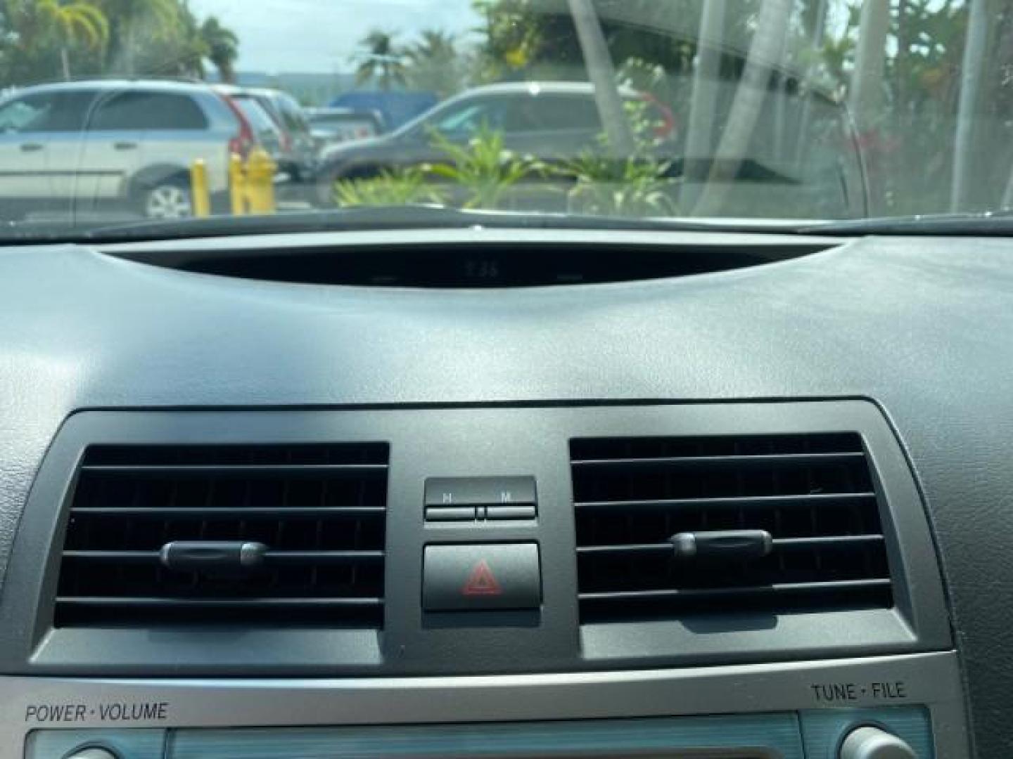 2007 Titanium Metallic /Ash Toyota Camry XLE LOW MILES 15,752 1 OWNER (4T1BK46K37U) with an 3.5L DOHC MPFI VVT-i 24-Valve V6 Engine engine, Automatic transmission, located at 4701 North Dixie Hwy, Pompano Beach, FL, 33064, (954) 422-2889, 26.240938, -80.123474 - OUR WEBPAGE FLORIDACARS1.COM HAS OVER 100 PHOTOS AND FREE CARFAX LINK 2007 Toyota Camry XLE 1 OWNER Sedan 4 DR 3.5L V6 F DOHC 24V Gasoline 31 MPG Front Wheel Drive Features ABS Brakes Air Conditioning Alloy Wheels AM/FM Stereo Automatic Transmission Auxiliary Audio Input Bluetooth Technology CD Audi- Photo#57