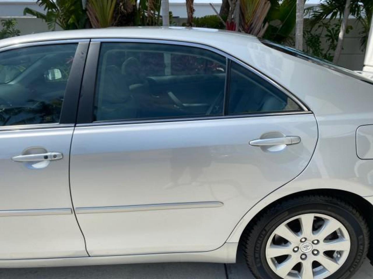 2007 Titanium Metallic /Ash Toyota Camry XLE LOW MILES 15,752 1 OWNER (4T1BK46K37U) with an 3.5L DOHC MPFI VVT-i 24-Valve V6 Engine engine, Automatic transmission, located at 4701 North Dixie Hwy, Pompano Beach, FL, 33064, (954) 422-2889, 26.240938, -80.123474 - OUR WEBPAGE FLORIDACARS1.COM HAS OVER 100 PHOTOS AND FREE CARFAX LINK 2007 Toyota Camry XLE 1 OWNER Sedan 4 DR 3.5L V6 F DOHC 24V Gasoline 31 MPG Front Wheel Drive Features ABS Brakes Air Conditioning Alloy Wheels AM/FM Stereo Automatic Transmission Auxiliary Audio Input Bluetooth Technology CD Audi- Photo#69