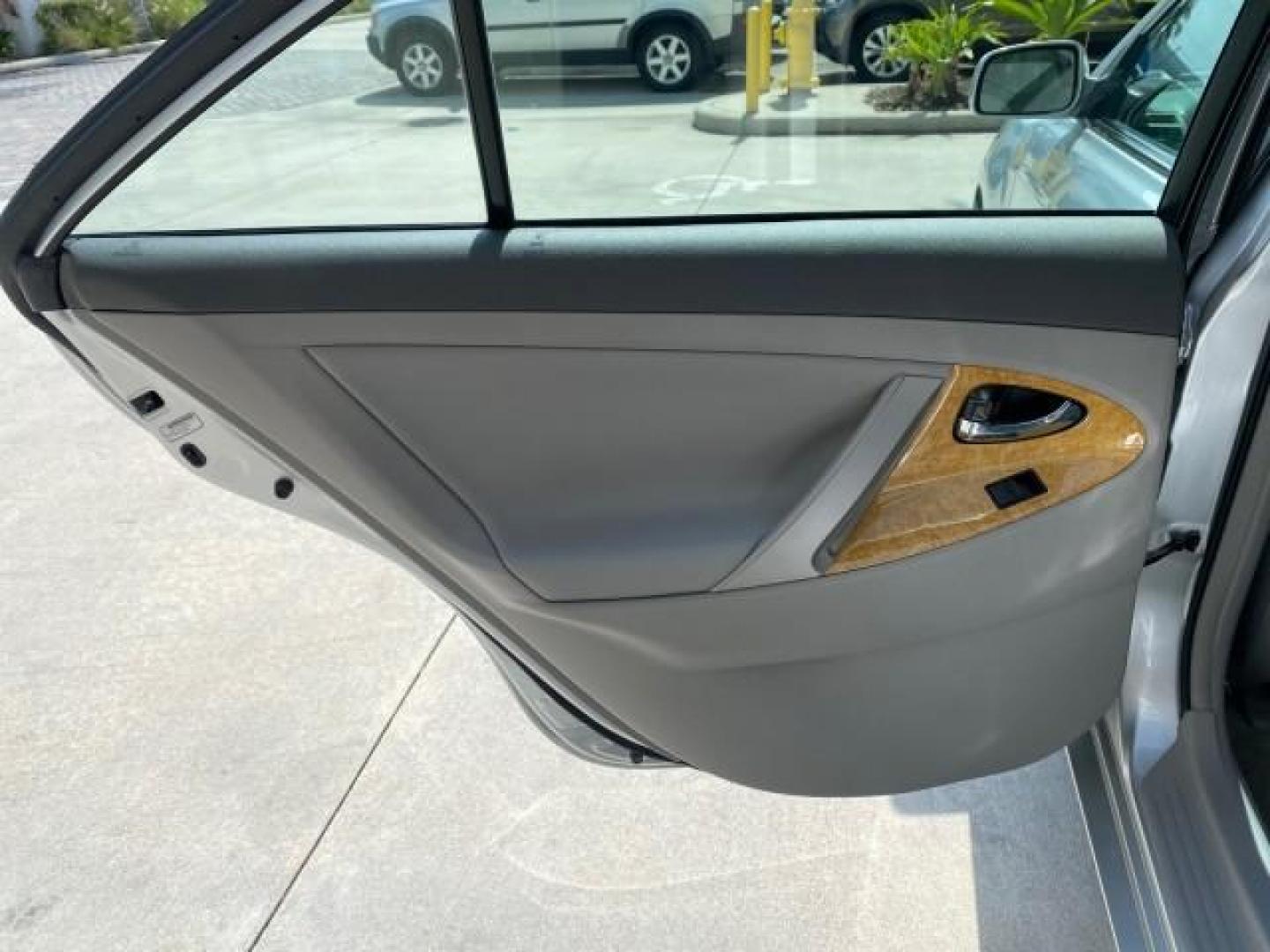 2007 Titanium Metallic /Ash Toyota Camry XLE LOW MILES 15,752 1 OWNER (4T1BK46K37U) with an 3.5L DOHC MPFI VVT-i 24-Valve V6 Engine engine, Automatic transmission, located at 4701 North Dixie Hwy, Pompano Beach, FL, 33064, (954) 422-2889, 26.240938, -80.123474 - OUR WEBPAGE FLORIDACARS1.COM HAS OVER 100 PHOTOS AND FREE CARFAX LINK 2007 Toyota Camry XLE 1 OWNER Sedan 4 DR 3.5L V6 F DOHC 24V Gasoline 31 MPG Front Wheel Drive Features ABS Brakes Air Conditioning Alloy Wheels AM/FM Stereo Automatic Transmission Auxiliary Audio Input Bluetooth Technology CD Audi- Photo#71