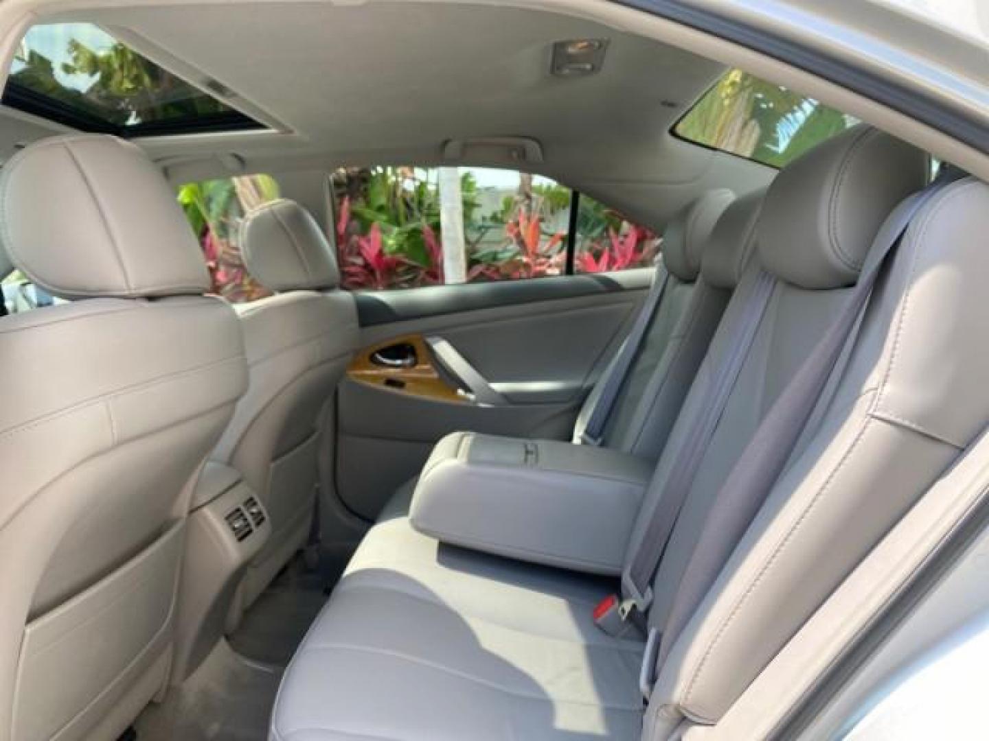 2007 Titanium Metallic /Ash Toyota Camry XLE LOW MILES 15,752 1 OWNER (4T1BK46K37U) with an 3.5L DOHC MPFI VVT-i 24-Valve V6 Engine engine, Automatic transmission, located at 4701 North Dixie Hwy, Pompano Beach, FL, 33064, (954) 422-2889, 26.240938, -80.123474 - OUR WEBPAGE FLORIDACARS1.COM HAS OVER 100 PHOTOS AND FREE CARFAX LINK 2007 Toyota Camry XLE 1 OWNER Sedan 4 DR 3.5L V6 F DOHC 24V Gasoline 31 MPG Front Wheel Drive Features ABS Brakes Air Conditioning Alloy Wheels AM/FM Stereo Automatic Transmission Auxiliary Audio Input Bluetooth Technology CD Audi- Photo#73