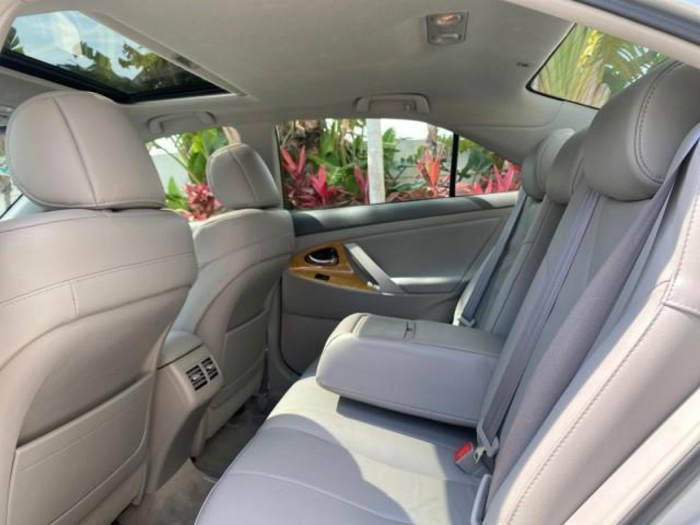 2007 Titanium Metallic /Ash Toyota Camry XLE LOW MILES 15,752 1 OWNER (4T1BK46K37U) with an 3.5L DOHC MPFI VVT-i 24-Valve V6 Engine engine, Automatic transmission, located at 4701 North Dixie Hwy, Pompano Beach, FL, 33064, (954) 422-2889, 26.240938, -80.123474 - OUR WEBPAGE FLORIDACARS1.COM HAS OVER 100 PHOTOS AND FREE CARFAX LINK 2007 Toyota Camry XLE 1 OWNER Sedan 4 DR 3.5L V6 F DOHC 24V Gasoline 31 MPG Front Wheel Drive Features ABS Brakes Air Conditioning Alloy Wheels AM/FM Stereo Automatic Transmission Auxiliary Audio Input Bluetooth Technology CD Audi- Photo#74