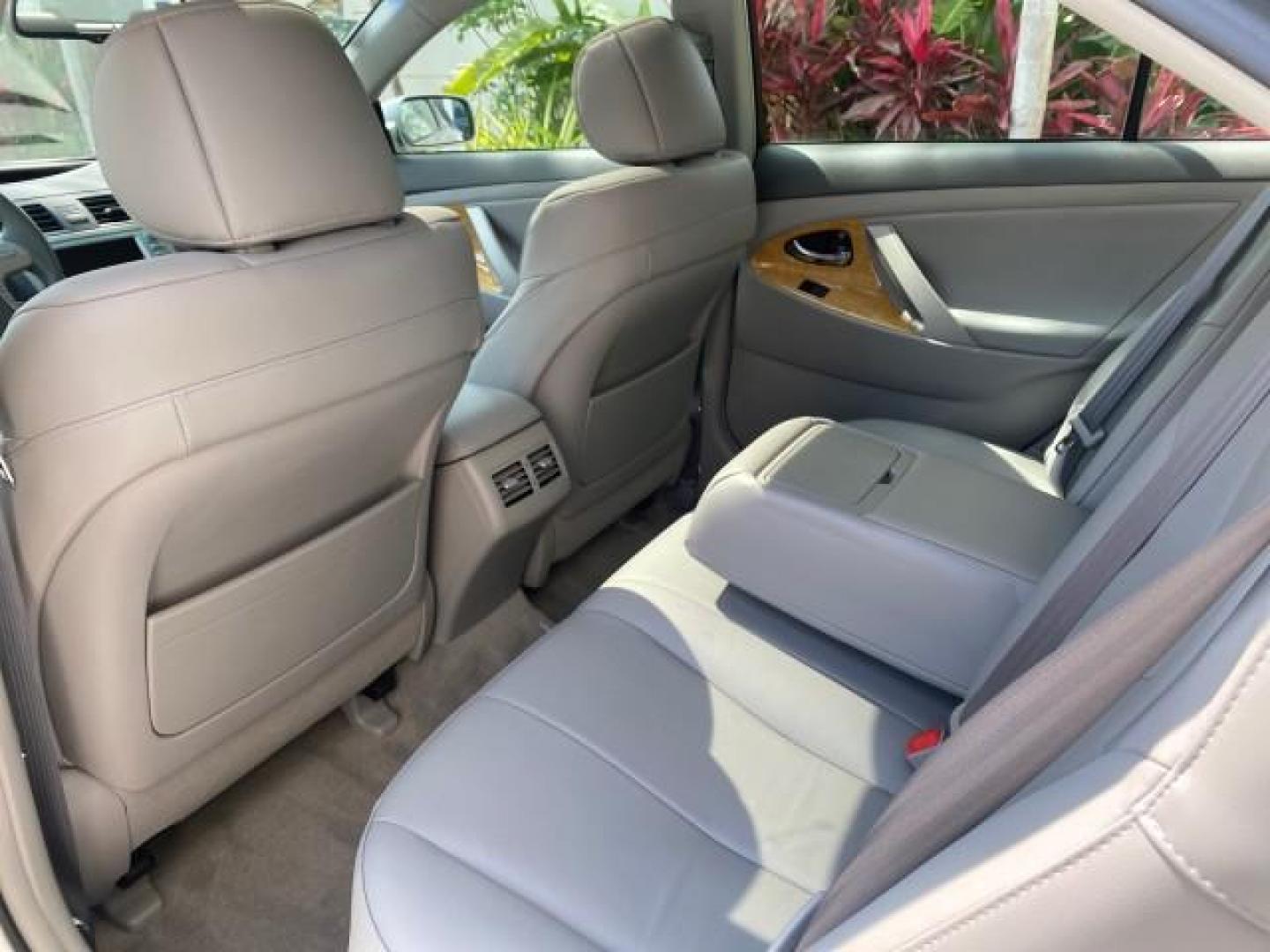 2007 Titanium Metallic /Ash Toyota Camry XLE LOW MILES 15,752 1 OWNER (4T1BK46K37U) with an 3.5L DOHC MPFI VVT-i 24-Valve V6 Engine engine, Automatic transmission, located at 4701 North Dixie Hwy, Pompano Beach, FL, 33064, (954) 422-2889, 26.240938, -80.123474 - OUR WEBPAGE FLORIDACARS1.COM HAS OVER 100 PHOTOS AND FREE CARFAX LINK 2007 Toyota Camry XLE 1 OWNER Sedan 4 DR 3.5L V6 F DOHC 24V Gasoline 31 MPG Front Wheel Drive Features ABS Brakes Air Conditioning Alloy Wheels AM/FM Stereo Automatic Transmission Auxiliary Audio Input Bluetooth Technology CD Audi- Photo#75
