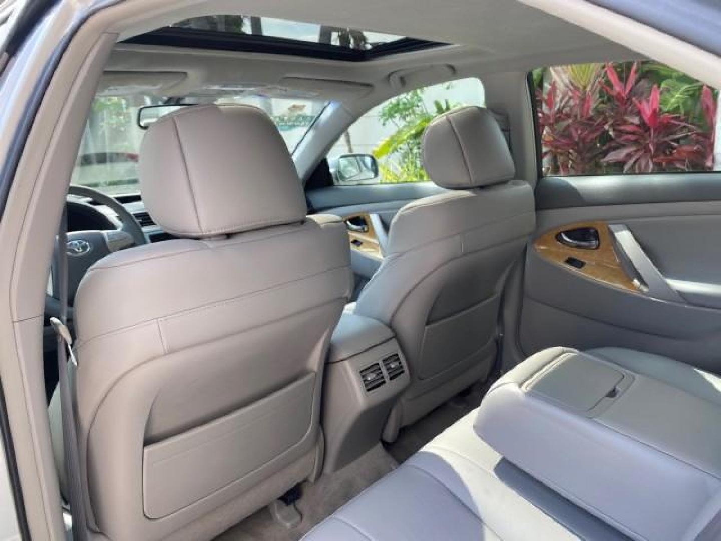 2007 Titanium Metallic /Ash Toyota Camry XLE LOW MILES 15,752 1 OWNER (4T1BK46K37U) with an 3.5L DOHC MPFI VVT-i 24-Valve V6 Engine engine, Automatic transmission, located at 4701 North Dixie Hwy, Pompano Beach, FL, 33064, (954) 422-2889, 26.240938, -80.123474 - OUR WEBPAGE FLORIDACARS1.COM HAS OVER 100 PHOTOS AND FREE CARFAX LINK 2007 Toyota Camry XLE 1 OWNER Sedan 4 DR 3.5L V6 F DOHC 24V Gasoline 31 MPG Front Wheel Drive Features ABS Brakes Air Conditioning Alloy Wheels AM/FM Stereo Automatic Transmission Auxiliary Audio Input Bluetooth Technology CD Audi- Photo#76