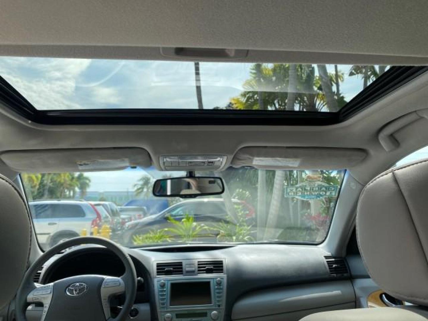 2007 Titanium Metallic /Ash Toyota Camry XLE LOW MILES 15,752 1 OWNER (4T1BK46K37U) with an 3.5L DOHC MPFI VVT-i 24-Valve V6 Engine engine, Automatic transmission, located at 4701 North Dixie Hwy, Pompano Beach, FL, 33064, (954) 422-2889, 26.240938, -80.123474 - OUR WEBPAGE FLORIDACARS1.COM HAS OVER 100 PHOTOS AND FREE CARFAX LINK 2007 Toyota Camry XLE 1 OWNER Sedan 4 DR 3.5L V6 F DOHC 24V Gasoline 31 MPG Front Wheel Drive Features ABS Brakes Air Conditioning Alloy Wheels AM/FM Stereo Automatic Transmission Auxiliary Audio Input Bluetooth Technology CD Audi- Photo#79