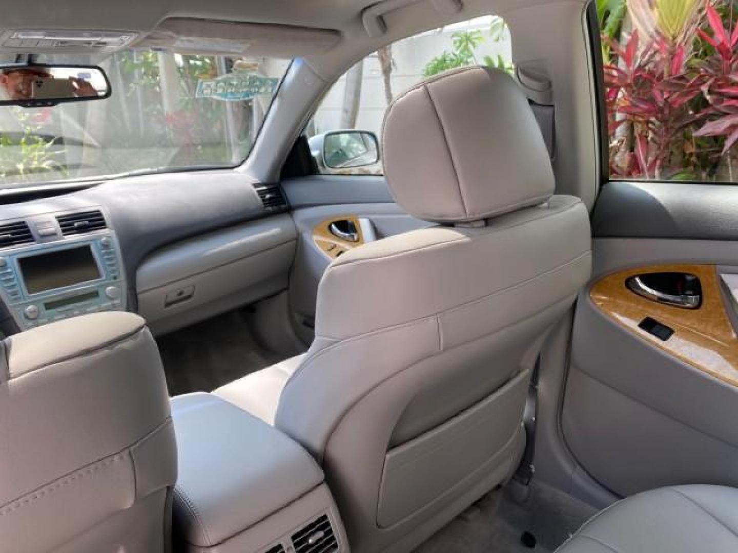 2007 Titanium Metallic /Ash Toyota Camry XLE LOW MILES 15,752 1 OWNER (4T1BK46K37U) with an 3.5L DOHC MPFI VVT-i 24-Valve V6 Engine engine, Automatic transmission, located at 4701 North Dixie Hwy, Pompano Beach, FL, 33064, (954) 422-2889, 26.240938, -80.123474 - OUR WEBPAGE FLORIDACARS1.COM HAS OVER 100 PHOTOS AND FREE CARFAX LINK 2007 Toyota Camry XLE 1 OWNER Sedan 4 DR 3.5L V6 F DOHC 24V Gasoline 31 MPG Front Wheel Drive Features ABS Brakes Air Conditioning Alloy Wheels AM/FM Stereo Automatic Transmission Auxiliary Audio Input Bluetooth Technology CD Audi- Photo#80