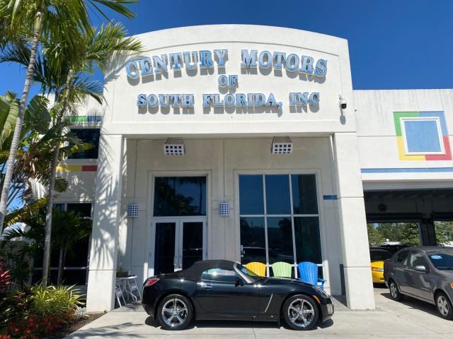 2008 Carbon Flash /Light Titanium Saturn Sky Red Line Carbon Flash SE 5 SPD (1G8MJ35X88Y) with an Turbocharged And Intercooled Ecotec 2.0L VVT DOHC 4-Cyl Aluminum Engine engine, Manual transmission, located at 4701 North Dixie Hwy, Pompano Beach, FL, 33064, (954) 422-2889, 26.240938, -80.123474 - OUR WEBPAGE FLORIDACARS1.COM HAS OVER 100 PHOTOS AND FREE CARFAX LINK 2008 Saturn SKY Red Line Carbon Flash SE Convertible 2.0L I4 F DOHC Gasoline 31 MPG Rear Wheel Drive Features ABS Brakes Air Conditioning Alloy Wheels AM/FM Stereo Auxiliary Audio Input CD Audio Cruise Control Leather Seats Manual - Photo#0