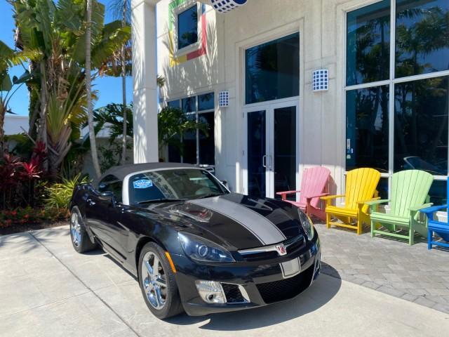2008 Carbon Flash /Light Titanium Saturn Sky Red Line Carbon Flash SE 5 SPD (1G8MJ35X88Y) with an Turbocharged And Intercooled Ecotec 2.0L VVT DOHC 4-Cyl Aluminum Engine engine, Manual transmission, located at 4701 North Dixie Hwy, Pompano Beach, FL, 33064, (954) 422-2889, 26.240938, -80.123474 - OUR WEBPAGE FLORIDACARS1.COM HAS OVER 100 PHOTOS AND FREE CARFAX LINK 2008 Saturn SKY Red Line Carbon Flash SE Convertible 2.0L I4 F DOHC Gasoline 31 MPG Rear Wheel Drive Features ABS Brakes Air Conditioning Alloy Wheels AM/FM Stereo Auxiliary Audio Input CD Audio Cruise Control Leather Seats Manual - Photo#1