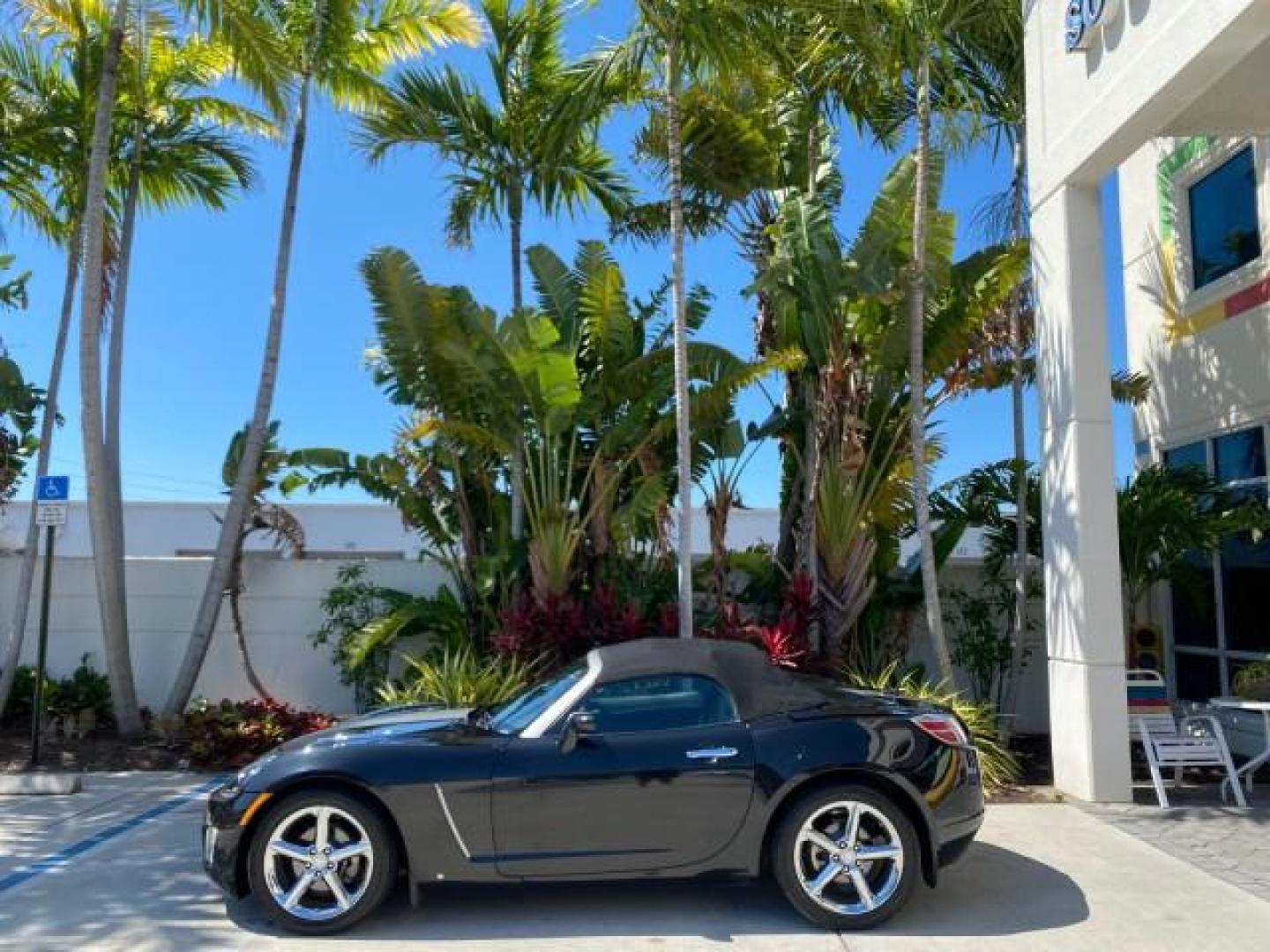 2008 Carbon Flash /Light Titanium Saturn Sky Red Line Carbon Flash SE 5 SPD (1G8MJ35X88Y) with an Turbocharged And Intercooled Ecotec 2.0L VVT DOHC 4-Cyl Aluminum Engine engine, Manual transmission, located at 4701 North Dixie Hwy, Pompano Beach, FL, 33064, (954) 422-2889, 26.240938, -80.123474 - OUR WEBPAGE FLORIDACARS1.COM HAS OVER 100 PHOTOS AND FREE CARFAX LINK 2008 Saturn SKY Red Line Carbon Flash SE Convertible 2.0L I4 F DOHC Gasoline 31 MPG Rear Wheel Drive Features ABS Brakes Air Conditioning Alloy Wheels AM/FM Stereo Auxiliary Audio Input CD Audio Cruise Control Leather Seats Manual - Photo#3