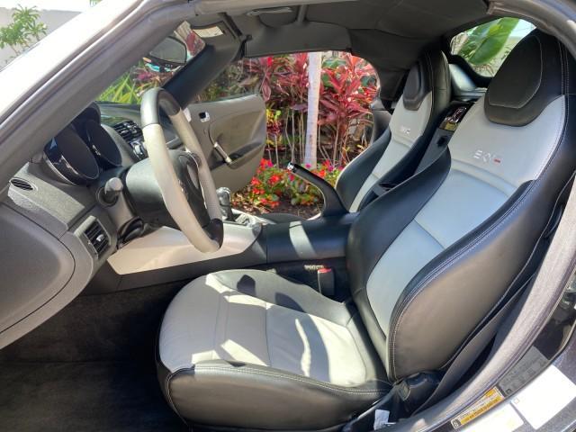 2008 Carbon Flash /Light Titanium Saturn Sky Red Line Carbon Flash SE 5 SPD (1G8MJ35X88Y) with an Turbocharged And Intercooled Ecotec 2.0L VVT DOHC 4-Cyl Aluminum Engine engine, Manual transmission, located at 4701 North Dixie Hwy, Pompano Beach, FL, 33064, (954) 422-2889, 26.240938, -80.123474 - OUR WEBPAGE FLORIDACARS1.COM HAS OVER 100 PHOTOS AND FREE CARFAX LINK 2008 Saturn SKY Red Line Carbon Flash SE Convertible 2.0L I4 F DOHC Gasoline 31 MPG Rear Wheel Drive Features ABS Brakes Air Conditioning Alloy Wheels AM/FM Stereo Auxiliary Audio Input CD Audio Cruise Control Leather Seats Manual - Photo#10