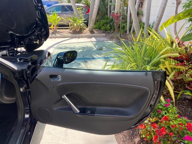 2008 Carbon Flash /Light Titanium Saturn Sky Red Line Carbon Flash SE 5 SPD (1G8MJ35X88Y) with an Turbocharged And Intercooled Ecotec 2.0L VVT DOHC 4-Cyl Aluminum Engine engine, Manual transmission, located at 4701 North Dixie Hwy, Pompano Beach, FL, 33064, (954) 422-2889, 26.240938, -80.123474 - OUR WEBPAGE FLORIDACARS1.COM HAS OVER 100 PHOTOS AND FREE CARFAX LINK 2008 Saturn SKY Red Line Carbon Flash SE Convertible 2.0L I4 F DOHC Gasoline 31 MPG Rear Wheel Drive Features ABS Brakes Air Conditioning Alloy Wheels AM/FM Stereo Auxiliary Audio Input CD Audio Cruise Control Leather Seats Manual - Photo#11