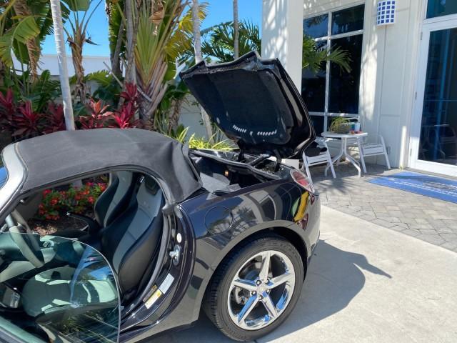 2008 Carbon Flash /Light Titanium Saturn Sky Red Line Carbon Flash SE 5 SPD (1G8MJ35X88Y) with an Turbocharged And Intercooled Ecotec 2.0L VVT DOHC 4-Cyl Aluminum Engine engine, Manual transmission, located at 4701 North Dixie Hwy, Pompano Beach, FL, 33064, (954) 422-2889, 26.240938, -80.123474 - OUR WEBPAGE FLORIDACARS1.COM HAS OVER 100 PHOTOS AND FREE CARFAX LINK 2008 Saturn SKY Red Line Carbon Flash SE Convertible 2.0L I4 F DOHC Gasoline 31 MPG Rear Wheel Drive Features ABS Brakes Air Conditioning Alloy Wheels AM/FM Stereo Auxiliary Audio Input CD Audio Cruise Control Leather Seats Manual - Photo#13