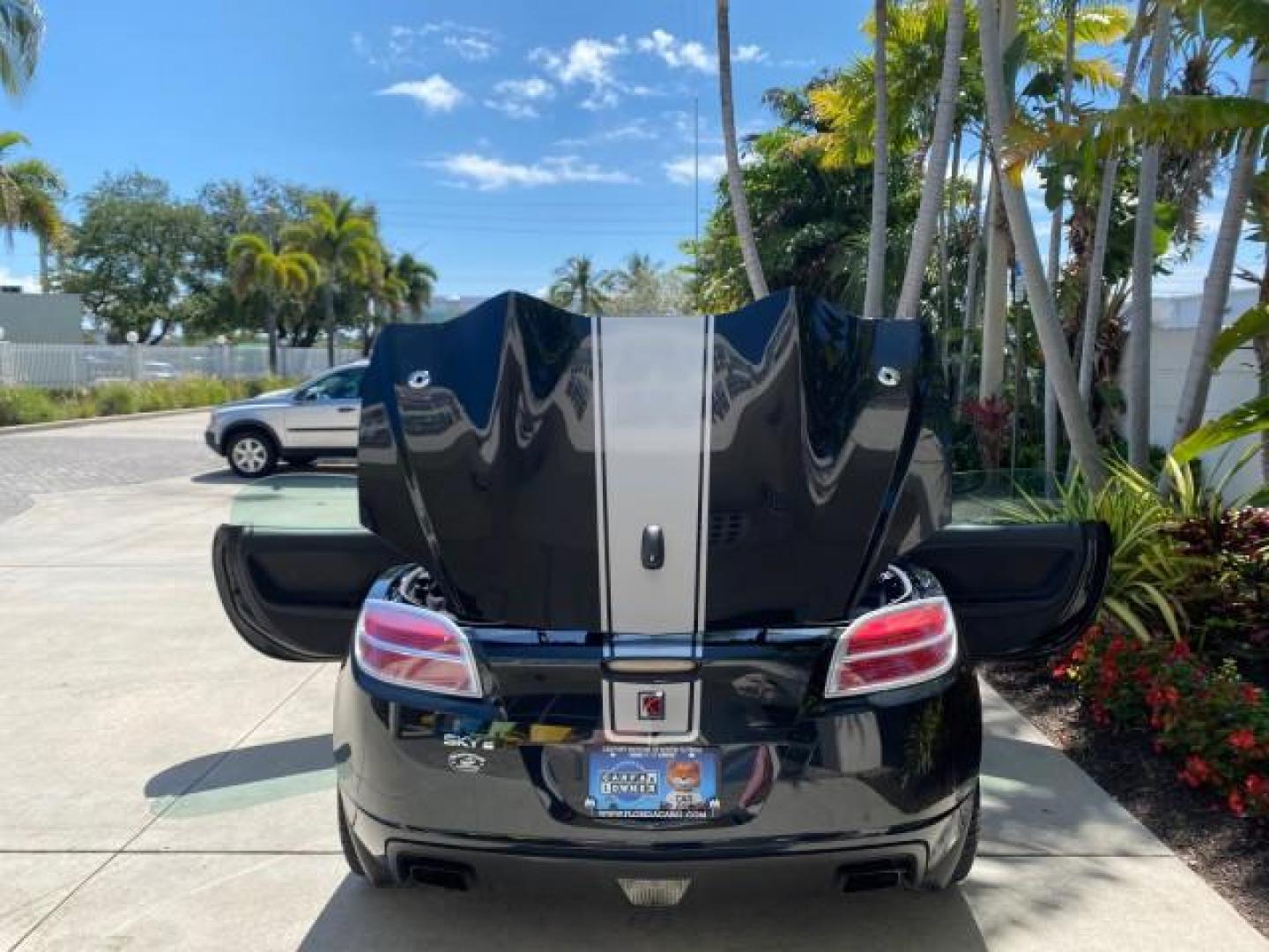 2008 Carbon Flash /Light Titanium Saturn Sky Red Line Carbon Flash SE 5 SPD (1G8MJ35X88Y) with an Turbocharged And Intercooled Ecotec 2.0L VVT DOHC 4-Cyl Aluminum Engine engine, Manual transmission, located at 4701 North Dixie Hwy, Pompano Beach, FL, 33064, (954) 422-2889, 26.240938, -80.123474 - OUR WEBPAGE FLORIDACARS1.COM HAS OVER 100 PHOTOS AND FREE CARFAX LINK 2008 Saturn SKY Red Line Carbon Flash SE Convertible 2.0L I4 F DOHC Gasoline 31 MPG Rear Wheel Drive Features ABS Brakes Air Conditioning Alloy Wheels AM/FM Stereo Auxiliary Audio Input CD Audio Cruise Control Leather Seats Manual - Photo#15