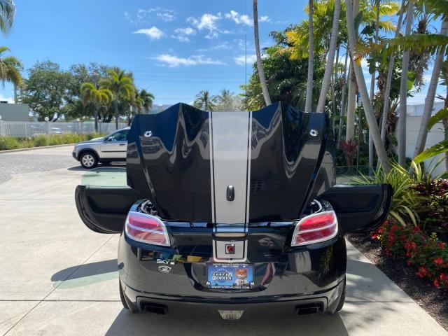 2008 Carbon Flash /Light Titanium Saturn Sky Red Line Carbon Flash SE 5 SPD (1G8MJ35X88Y) with an Turbocharged And Intercooled Ecotec 2.0L VVT DOHC 4-Cyl Aluminum Engine engine, Manual transmission, located at 4701 North Dixie Hwy, Pompano Beach, FL, 33064, (954) 422-2889, 26.240938, -80.123474 - OUR WEBPAGE FLORIDACARS1.COM HAS OVER 100 PHOTOS AND FREE CARFAX LINK 2008 Saturn SKY Red Line Carbon Flash SE Convertible 2.0L I4 F DOHC Gasoline 31 MPG Rear Wheel Drive Features ABS Brakes Air Conditioning Alloy Wheels AM/FM Stereo Auxiliary Audio Input CD Audio Cruise Control Leather Seats Manual - Photo#15