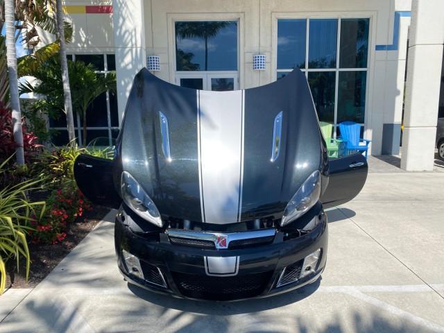 2008 Carbon Flash /Light Titanium Saturn Sky Red Line Carbon Flash SE 5 SPD (1G8MJ35X88Y) with an Turbocharged And Intercooled Ecotec 2.0L VVT DOHC 4-Cyl Aluminum Engine engine, Manual transmission, located at 4701 North Dixie Hwy, Pompano Beach, FL, 33064, (954) 422-2889, 26.240938, -80.123474 - OUR WEBPAGE FLORIDACARS1.COM HAS OVER 100 PHOTOS AND FREE CARFAX LINK 2008 Saturn SKY Red Line Carbon Flash SE Convertible 2.0L I4 F DOHC Gasoline 31 MPG Rear Wheel Drive Features ABS Brakes Air Conditioning Alloy Wheels AM/FM Stereo Auxiliary Audio Input CD Audio Cruise Control Leather Seats Manual - Photo#16