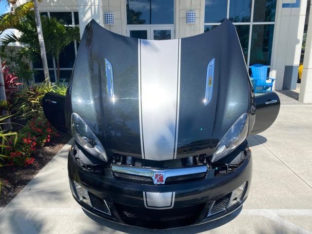 2008 Carbon Flash /Light Titanium Saturn Sky Red Line Carbon Flash SE 5 SPD (1G8MJ35X88Y) with an Turbocharged And Intercooled Ecotec 2.0L VVT DOHC 4-Cyl Aluminum Engine engine, Manual transmission, located at 4701 North Dixie Hwy, Pompano Beach, FL, 33064, (954) 422-2889, 26.240938, -80.123474 - OUR WEBPAGE FLORIDACARS1.COM HAS OVER 100 PHOTOS AND FREE CARFAX LINK 2008 Saturn SKY Red Line Carbon Flash SE Convertible 2.0L I4 F DOHC Gasoline 31 MPG Rear Wheel Drive Features ABS Brakes Air Conditioning Alloy Wheels AM/FM Stereo Auxiliary Audio Input CD Audio Cruise Control Leather Seats Manual - Photo#17