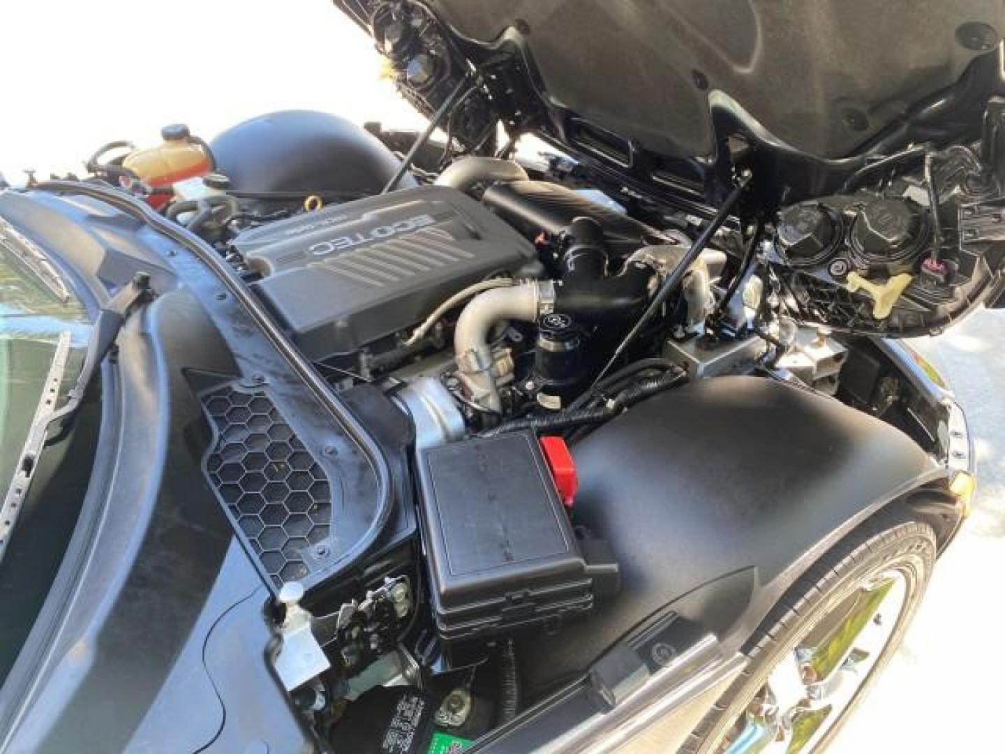 2008 Carbon Flash /Light Titanium Saturn Sky Red Line Carbon Flash SE 5 SPD (1G8MJ35X88Y) with an Turbocharged And Intercooled Ecotec 2.0L VVT DOHC 4-Cyl Aluminum Engine engine, Manual transmission, located at 4701 North Dixie Hwy, Pompano Beach, FL, 33064, (954) 422-2889, 26.240938, -80.123474 - OUR WEBPAGE FLORIDACARS1.COM HAS OVER 100 PHOTOS AND FREE CARFAX LINK 2008 Saturn SKY Red Line Carbon Flash SE Convertible 2.0L I4 F DOHC Gasoline 31 MPG Rear Wheel Drive Features ABS Brakes Air Conditioning Alloy Wheels AM/FM Stereo Auxiliary Audio Input CD Audio Cruise Control Leather Seats Manual - Photo#25