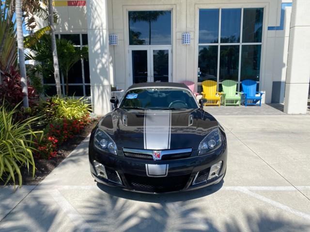 2008 Carbon Flash /Light Titanium Saturn Sky Red Line Carbon Flash SE 5 SPD (1G8MJ35X88Y) with an Turbocharged And Intercooled Ecotec 2.0L VVT DOHC 4-Cyl Aluminum Engine engine, Manual transmission, located at 4701 North Dixie Hwy, Pompano Beach, FL, 33064, (954) 422-2889, 26.240938, -80.123474 - OUR WEBPAGE FLORIDACARS1.COM HAS OVER 100 PHOTOS AND FREE CARFAX LINK 2008 Saturn SKY Red Line Carbon Flash SE Convertible 2.0L I4 F DOHC Gasoline 31 MPG Rear Wheel Drive Features ABS Brakes Air Conditioning Alloy Wheels AM/FM Stereo Auxiliary Audio Input CD Audio Cruise Control Leather Seats Manual - Photo#26