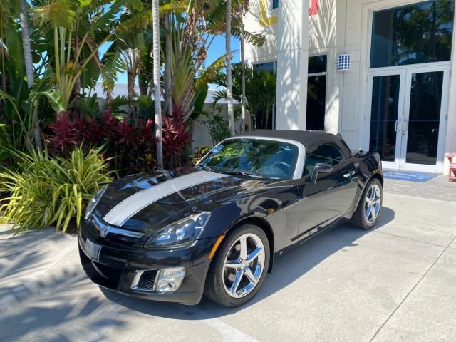 2008 Carbon Flash /Light Titanium Saturn Sky Red Line Carbon Flash SE 5 SPD (1G8MJ35X88Y) with an Turbocharged And Intercooled Ecotec 2.0L VVT DOHC 4-Cyl Aluminum Engine engine, Manual transmission, located at 4701 North Dixie Hwy, Pompano Beach, FL, 33064, (954) 422-2889, 26.240938, -80.123474 - OUR WEBPAGE FLORIDACARS1.COM HAS OVER 100 PHOTOS AND FREE CARFAX LINK 2008 Saturn SKY Red Line Carbon Flash SE Convertible 2.0L I4 F DOHC Gasoline 31 MPG Rear Wheel Drive Features ABS Brakes Air Conditioning Alloy Wheels AM/FM Stereo Auxiliary Audio Input CD Audio Cruise Control Leather Seats Manual - Photo#28