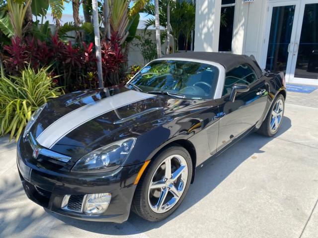 2008 Carbon Flash /Light Titanium Saturn Sky Red Line Carbon Flash SE 5 SPD (1G8MJ35X88Y) with an Turbocharged And Intercooled Ecotec 2.0L VVT DOHC 4-Cyl Aluminum Engine engine, Manual transmission, located at 4701 North Dixie Hwy, Pompano Beach, FL, 33064, (954) 422-2889, 26.240938, -80.123474 - OUR WEBPAGE FLORIDACARS1.COM HAS OVER 100 PHOTOS AND FREE CARFAX LINK 2008 Saturn SKY Red Line Carbon Flash SE Convertible 2.0L I4 F DOHC Gasoline 31 MPG Rear Wheel Drive Features ABS Brakes Air Conditioning Alloy Wheels AM/FM Stereo Auxiliary Audio Input CD Audio Cruise Control Leather Seats Manual - Photo#29