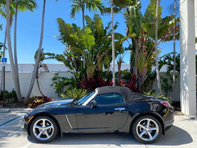 2008 Carbon Flash /Light Titanium Saturn Sky Red Line Carbon Flash SE 5 SPD (1G8MJ35X88Y) with an Turbocharged And Intercooled Ecotec 2.0L VVT DOHC 4-Cyl Aluminum Engine engine, Manual transmission, located at 4701 North Dixie Hwy, Pompano Beach, FL, 33064, (954) 422-2889, 26.240938, -80.123474 - OUR WEBPAGE FLORIDACARS1.COM HAS OVER 100 PHOTOS AND FREE CARFAX LINK 2008 Saturn SKY Red Line Carbon Flash SE Convertible 2.0L I4 F DOHC Gasoline 31 MPG Rear Wheel Drive Features ABS Brakes Air Conditioning Alloy Wheels AM/FM Stereo Auxiliary Audio Input CD Audio Cruise Control Leather Seats Manual - Photo#30