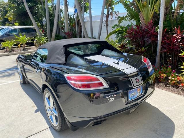 2008 Carbon Flash /Light Titanium Saturn Sky Red Line Carbon Flash SE 5 SPD (1G8MJ35X88Y) with an Turbocharged And Intercooled Ecotec 2.0L VVT DOHC 4-Cyl Aluminum Engine engine, Manual transmission, located at 4701 North Dixie Hwy, Pompano Beach, FL, 33064, (954) 422-2889, 26.240938, -80.123474 - OUR WEBPAGE FLORIDACARS1.COM HAS OVER 100 PHOTOS AND FREE CARFAX LINK 2008 Saturn SKY Red Line Carbon Flash SE Convertible 2.0L I4 F DOHC Gasoline 31 MPG Rear Wheel Drive Features ABS Brakes Air Conditioning Alloy Wheels AM/FM Stereo Auxiliary Audio Input CD Audio Cruise Control Leather Seats Manual - Photo#33