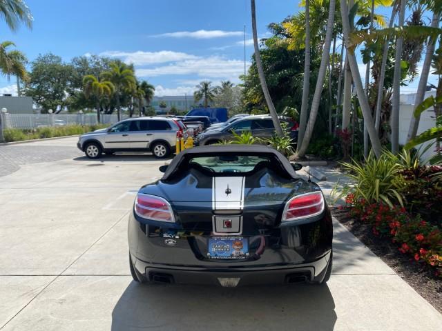 2008 Carbon Flash /Light Titanium Saturn Sky Red Line Carbon Flash SE 5 SPD (1G8MJ35X88Y) with an Turbocharged And Intercooled Ecotec 2.0L VVT DOHC 4-Cyl Aluminum Engine engine, Manual transmission, located at 4701 North Dixie Hwy, Pompano Beach, FL, 33064, (954) 422-2889, 26.240938, -80.123474 - OUR WEBPAGE FLORIDACARS1.COM HAS OVER 100 PHOTOS AND FREE CARFAX LINK 2008 Saturn SKY Red Line Carbon Flash SE Convertible 2.0L I4 F DOHC Gasoline 31 MPG Rear Wheel Drive Features ABS Brakes Air Conditioning Alloy Wheels AM/FM Stereo Auxiliary Audio Input CD Audio Cruise Control Leather Seats Manual - Photo#34